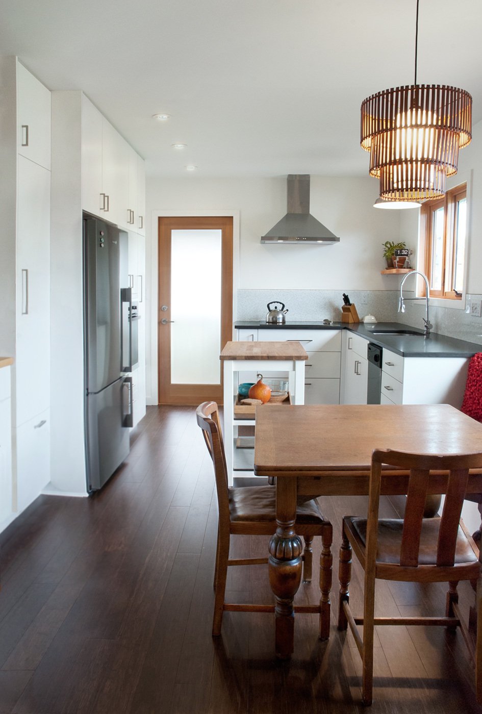 This project was a kitchen renovation for a young couple with a love of both bohemian and modern design. Working in conjunction with Andrew Barker of AJ Barker Design, we completely gutted the kitchen's original 1960's kitchen and created a space th