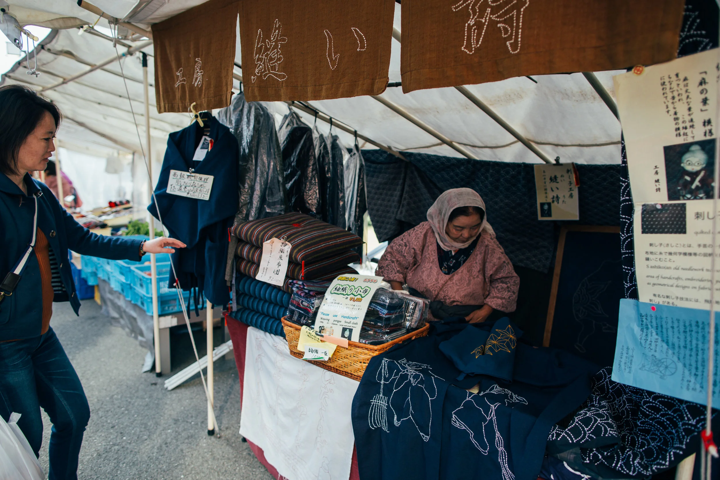 A vendor selling traditional Japanese robes with hand stitched designs. Not particularly cheap, but of course you are paying for the craftsmanship and skill.
