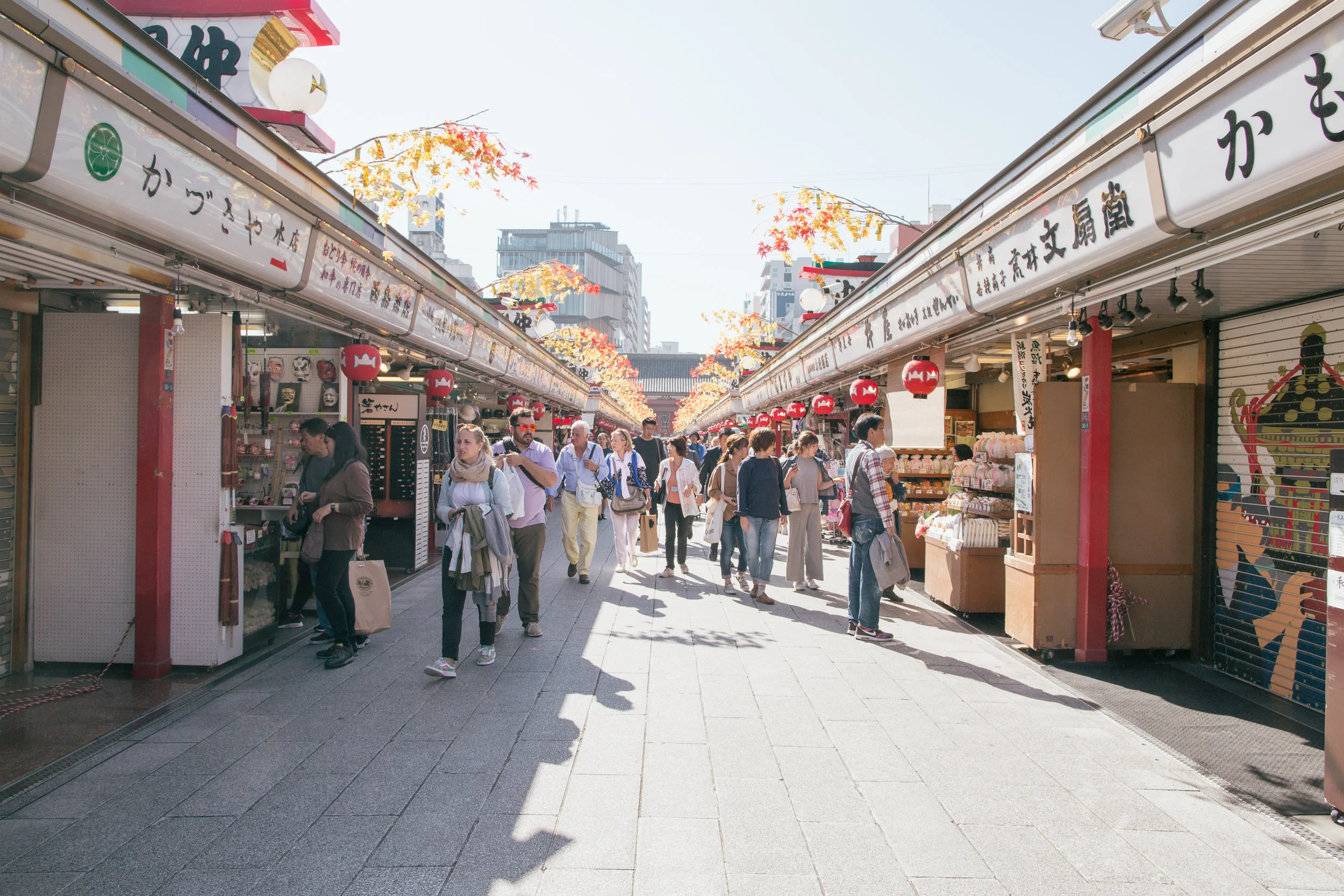 The street leading into the Senso-ji in Asakusa. Pictured here is Nakamise-dori which is lined with shops selling snacks and souvenirs. In the distance you can see Kengo Kuma's Asakusa Culture & Tourism Center.