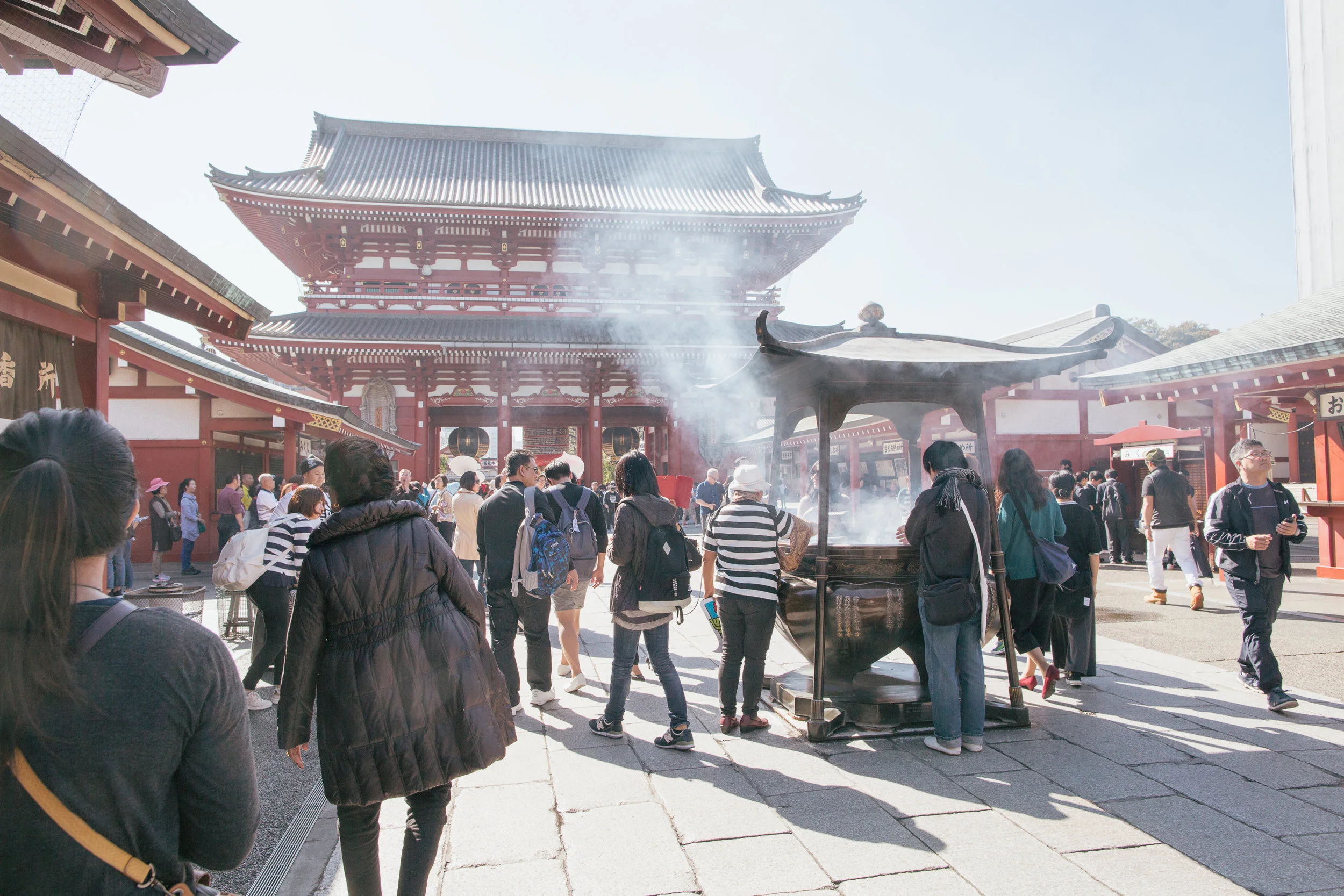 On the inner grounds of the temple you will find tourists and locals alike. The smoke coming from the incense is thought to be good luck and visitors will often waft the smoke over themselves to receive the blessing. I guess the question is, what if you waft the smoke straight into your lungs? Blessing or curse?