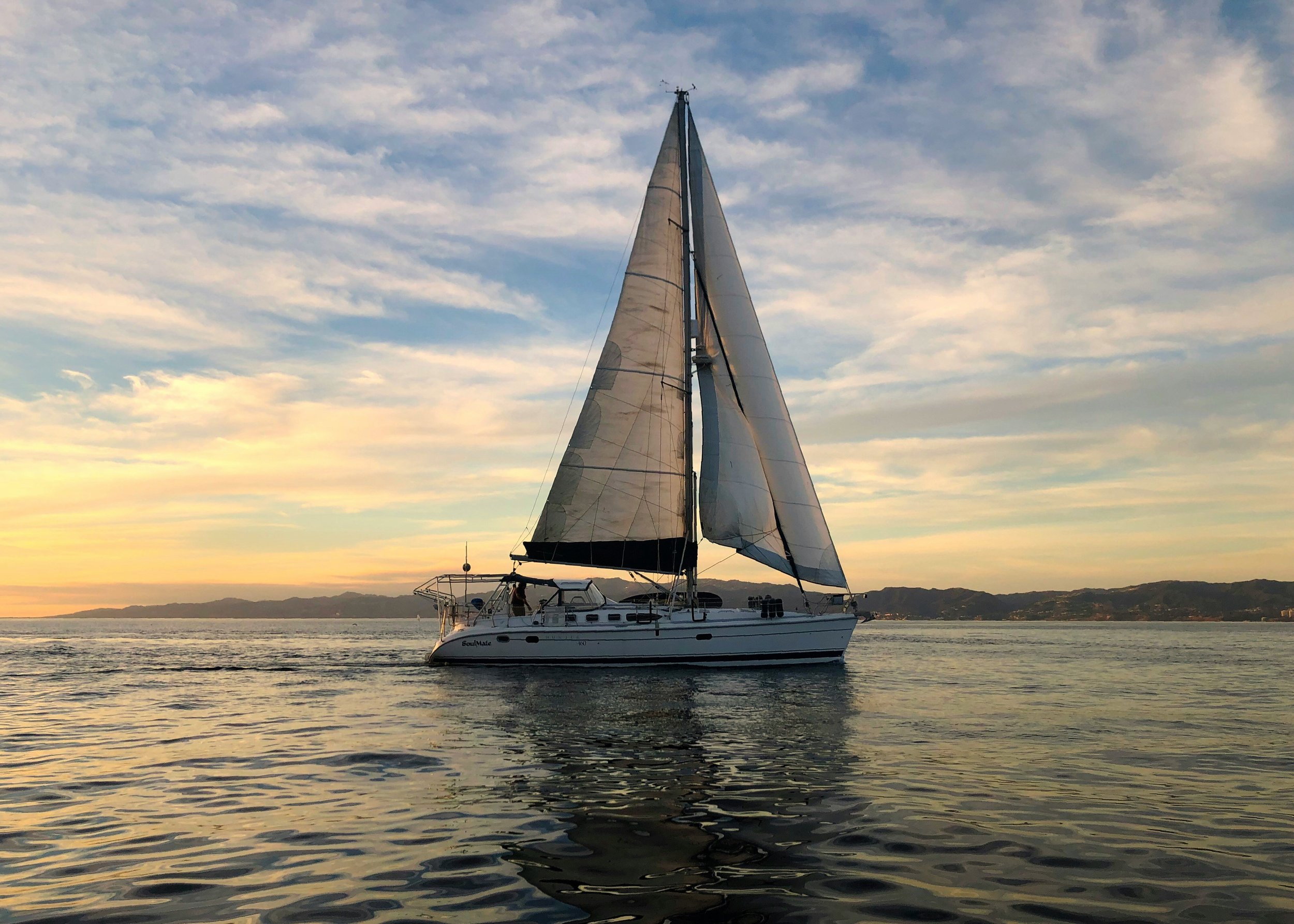 Sailing boat on open water representing disciplined wealth management and financial planning by Schroeder Capital Management