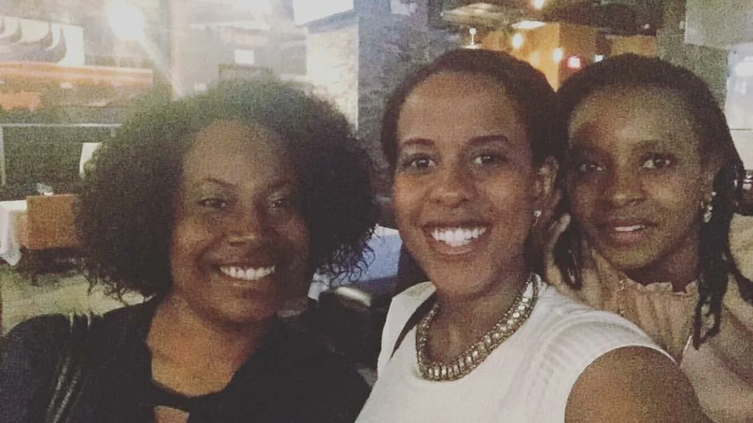 Krystin Wills at Young African Society members.