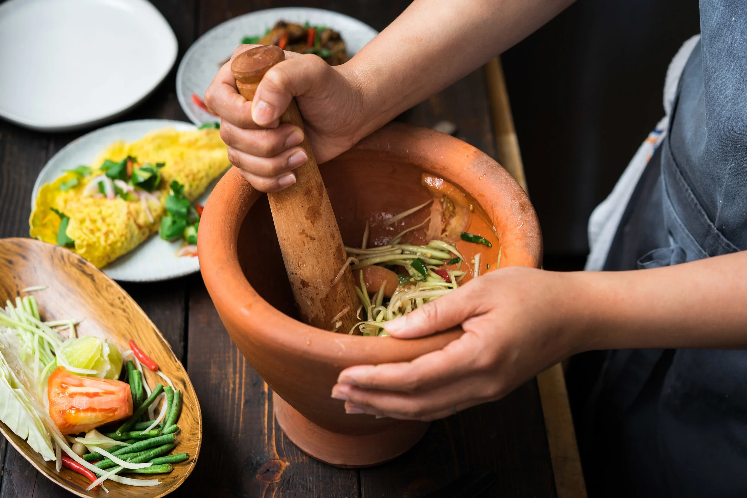 Chef Lalita Kaewsawang worked on Som Tum, a green papaya salad.
