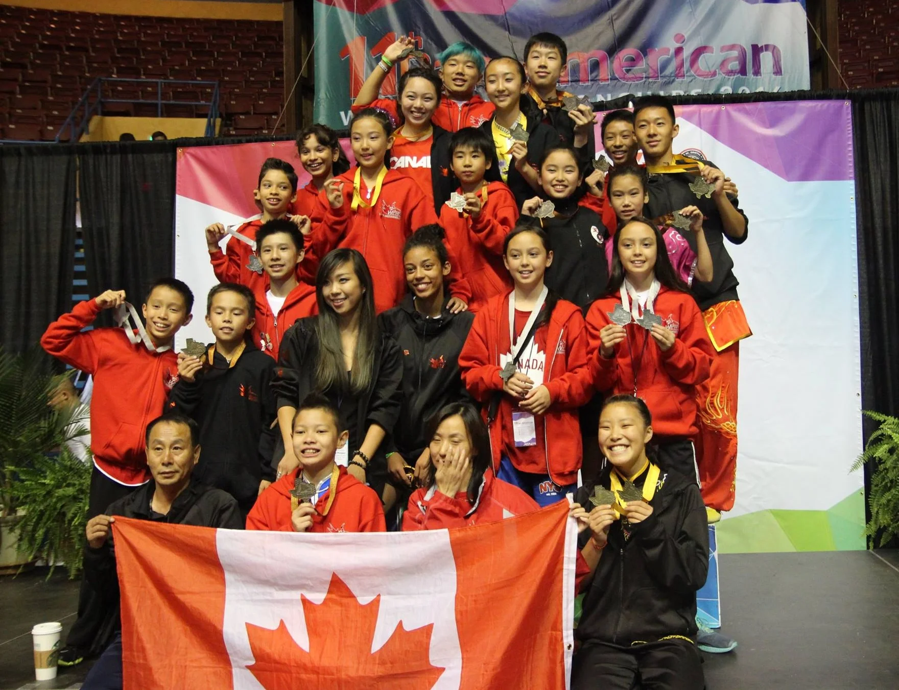 Teams Canada and China at the 6th World Junior Wushu Championships, 2016.