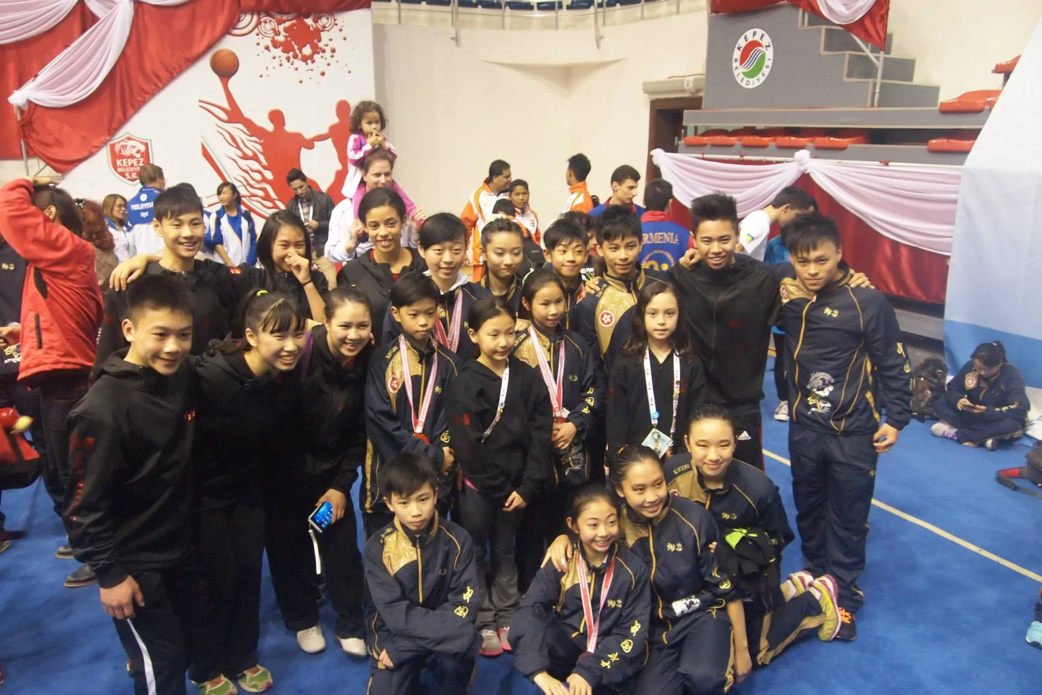 Teams Canada and Hong Kong at the 5th World Junior Wushu Championships, 2014.