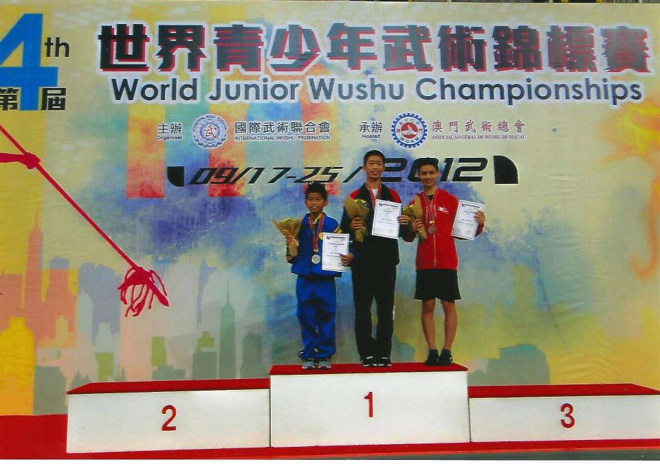 Nima accepting bronze at the 4th World Junior Wushu Championships, 2012.