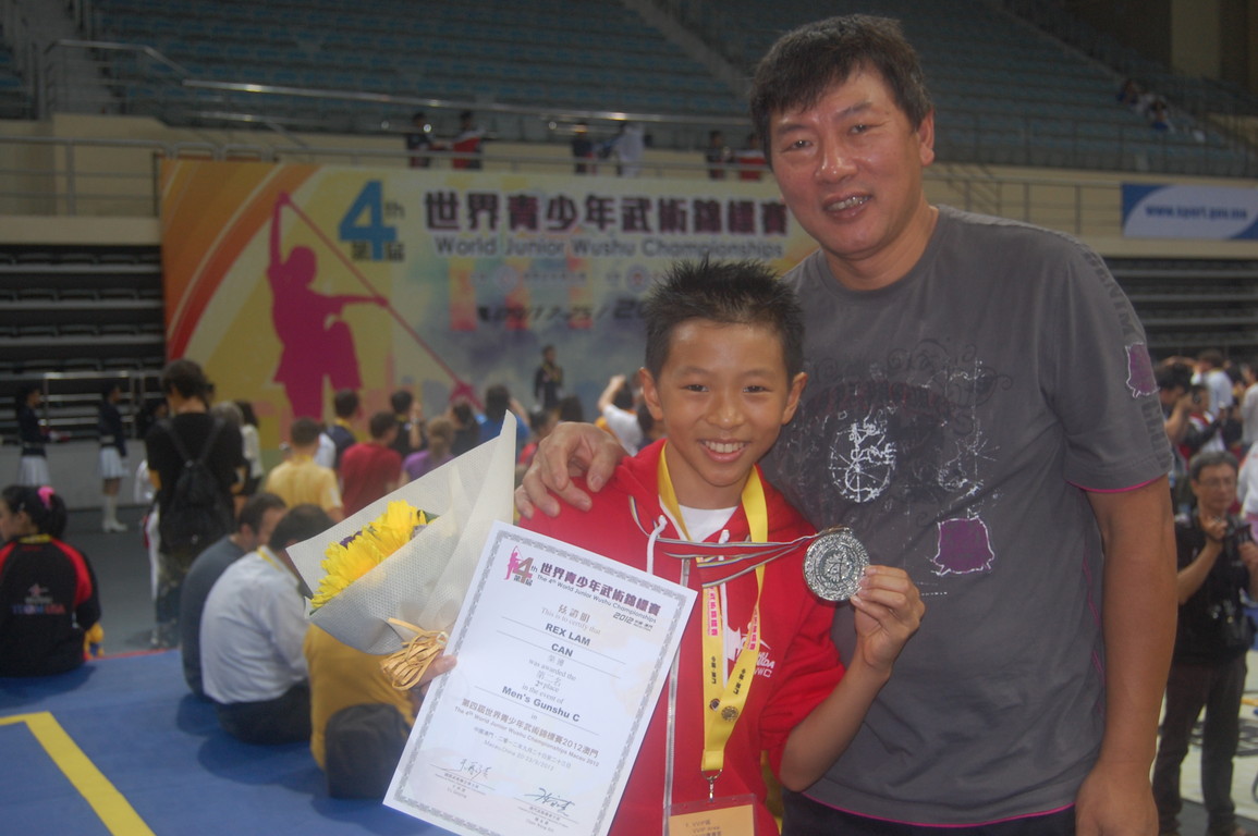 Rex and his dad, silver in Gunshu at the 4th WJWC in Macau, China.