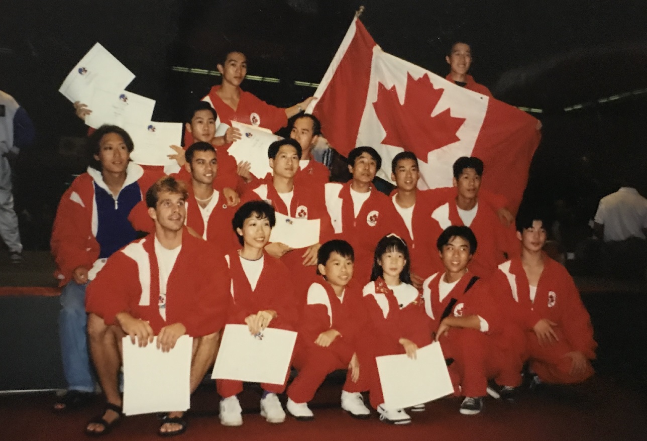 Leading the Canadian team at 3rd World Wushu Championships, 1995