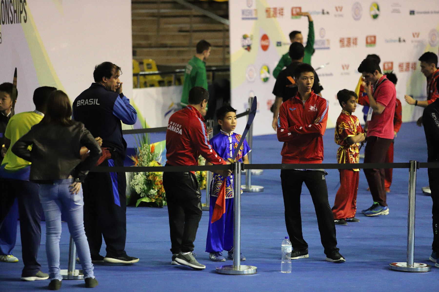 Mentoring athlete at 2018 World Junior Wushu Championships
