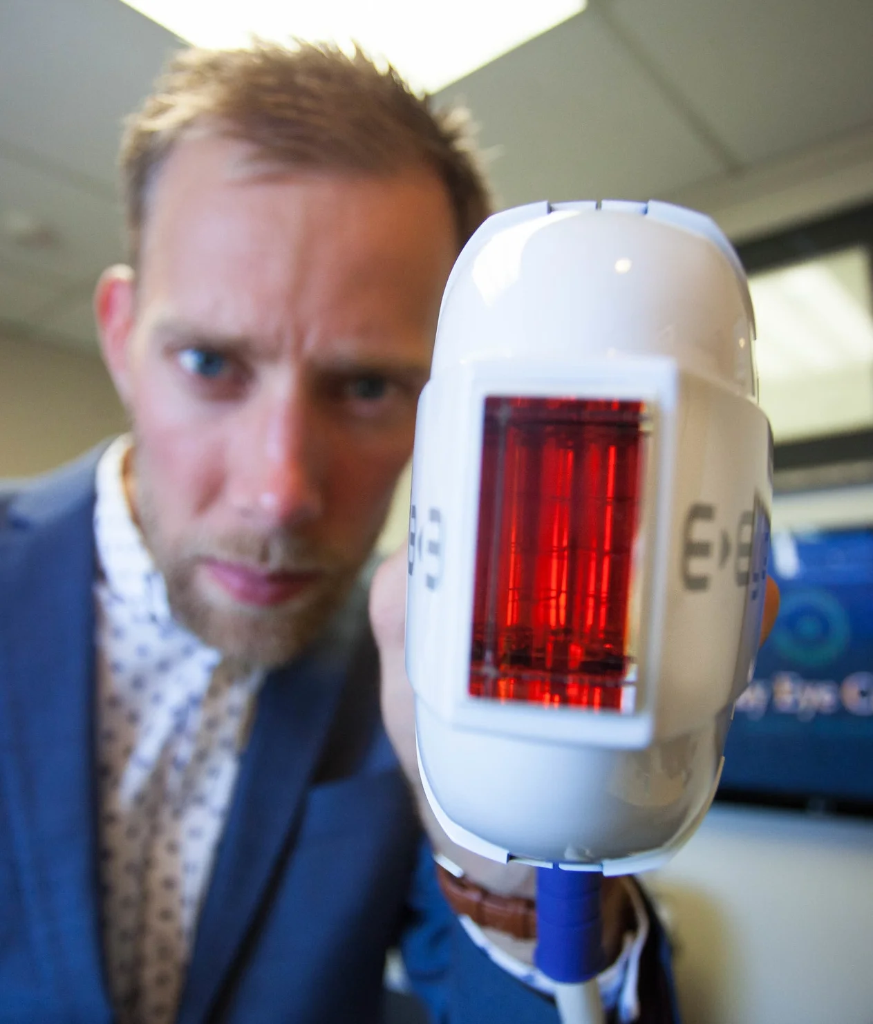 Our therapeutic optometrist Mr Alex Petty with the IPL device applicator