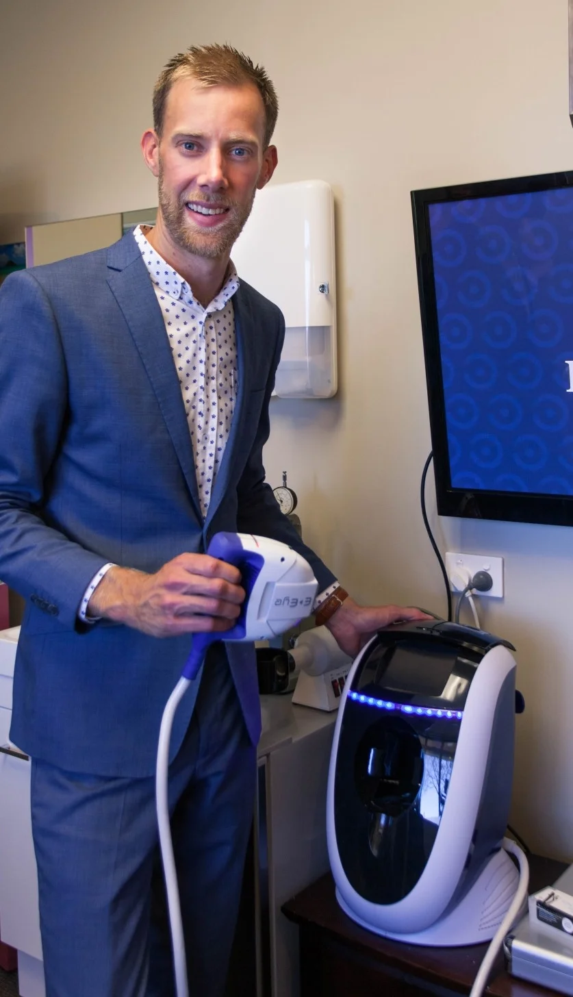 Alex about to use our IPL device to treat dry eye.
