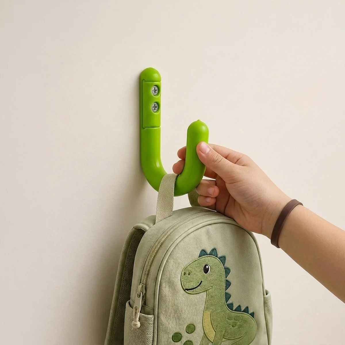 Safe Coat Hook - green with hand and bag (expanded).jpg