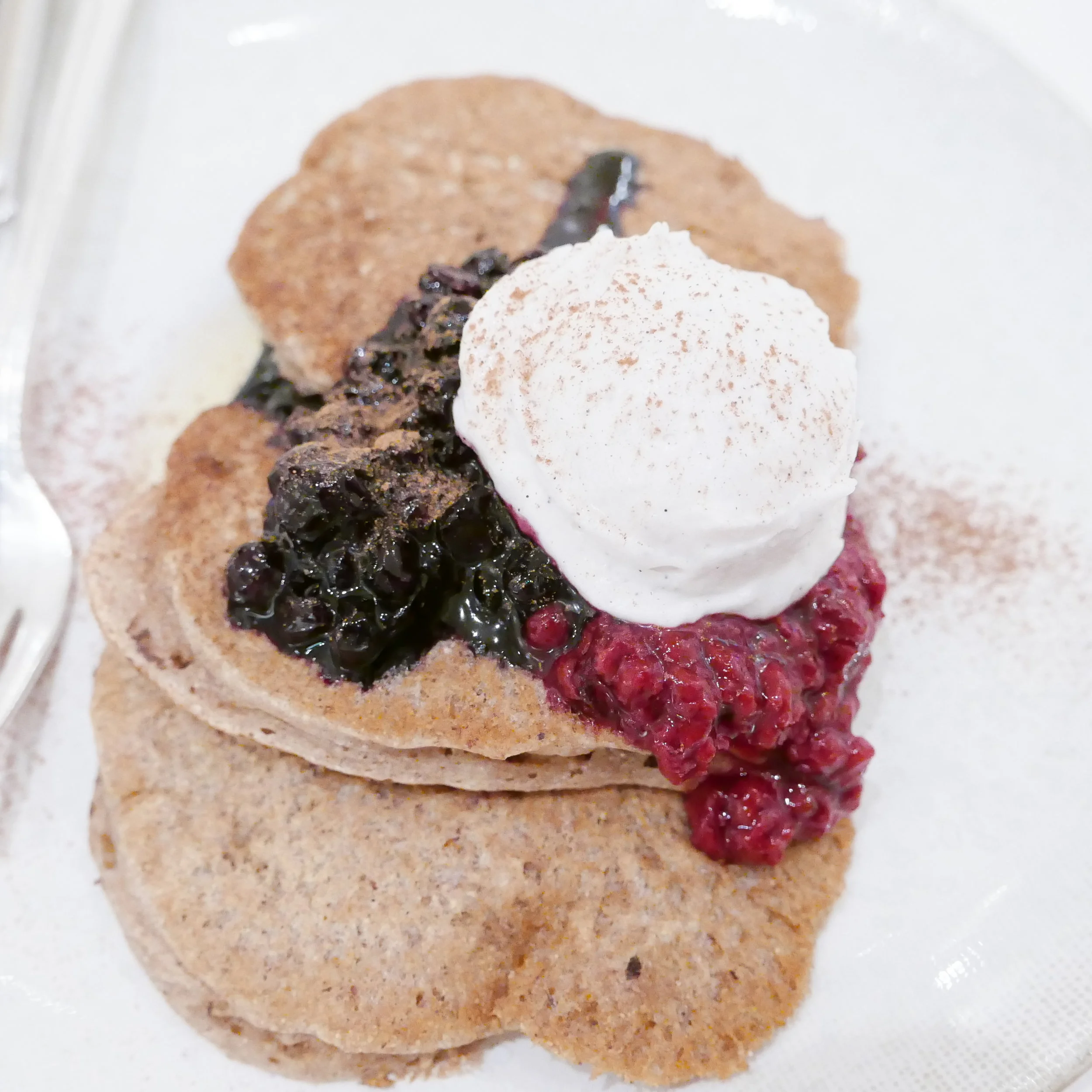 Wild blueberry einkorn pancakes coconut cream, maple syrup