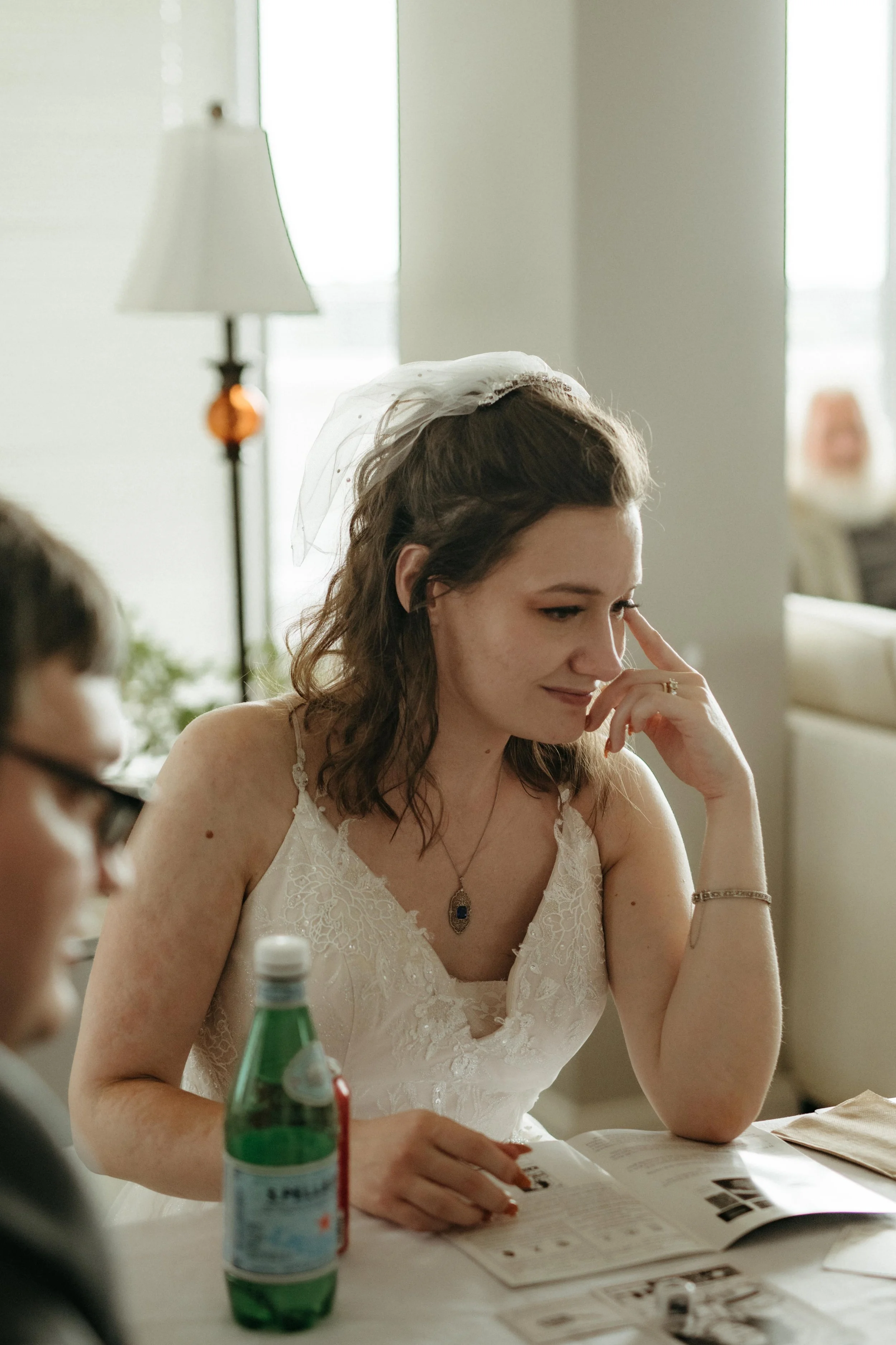Moody Memphis wedding photographer a bride and groom play a board game at their wedding reception. Documentary Memphis Wedding Photographer. Cinematic Memphis wedding photographer.