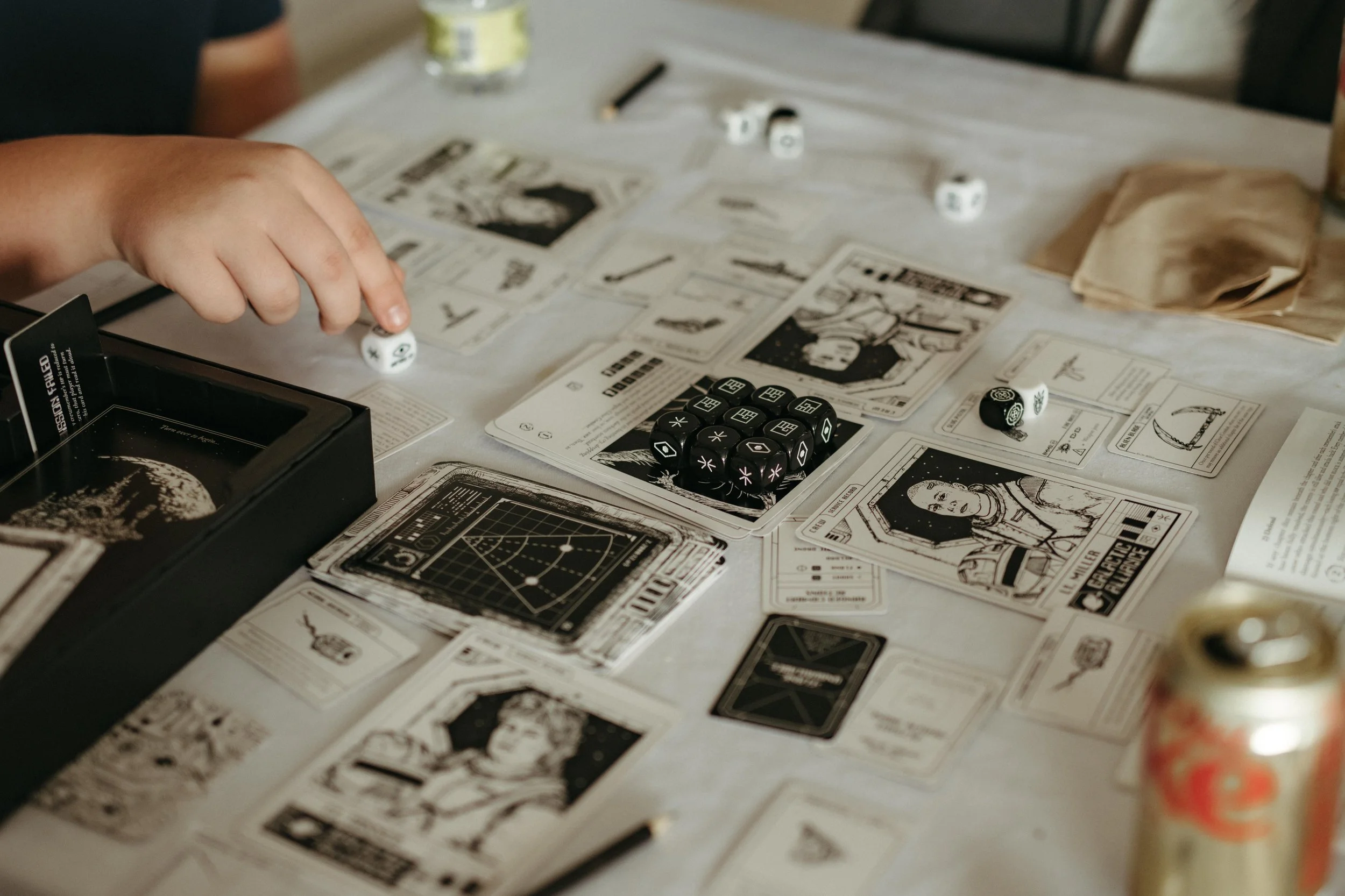 Moody Memphis wedding photographer a bride and groom play a board game at their wedding reception. Documentary Memphis Wedding Photographer. Cinematic Memphis wedding photographer.