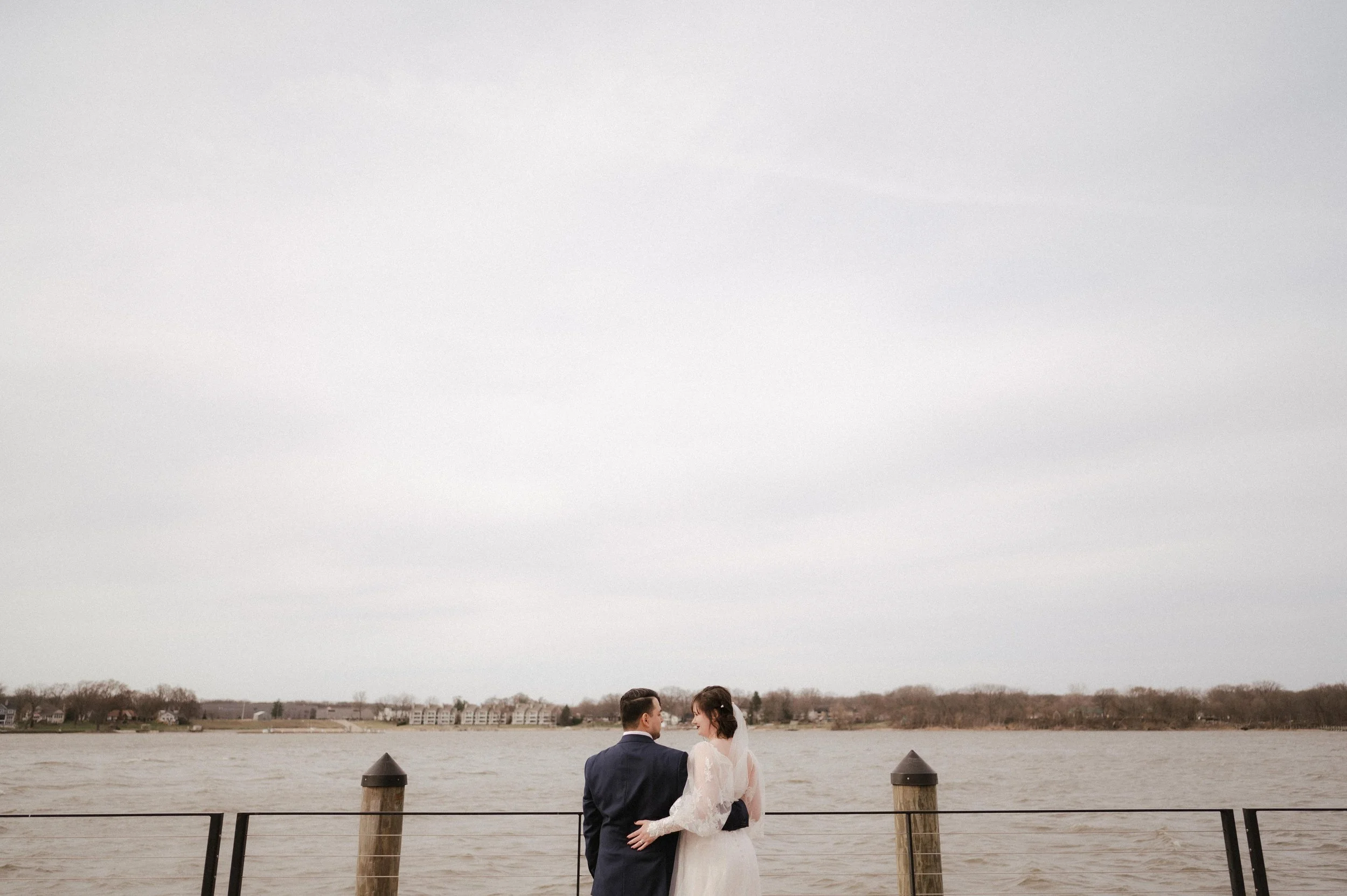 Wedding photos inspired by Wes Anderson, wedding photos inspired by The Grand Budapest Hotel. Holland Michigan wedding at Boatwerks, moody Michigan photographer, cinematic Michigan wedding photographer, Michigan documentary wedding photographer