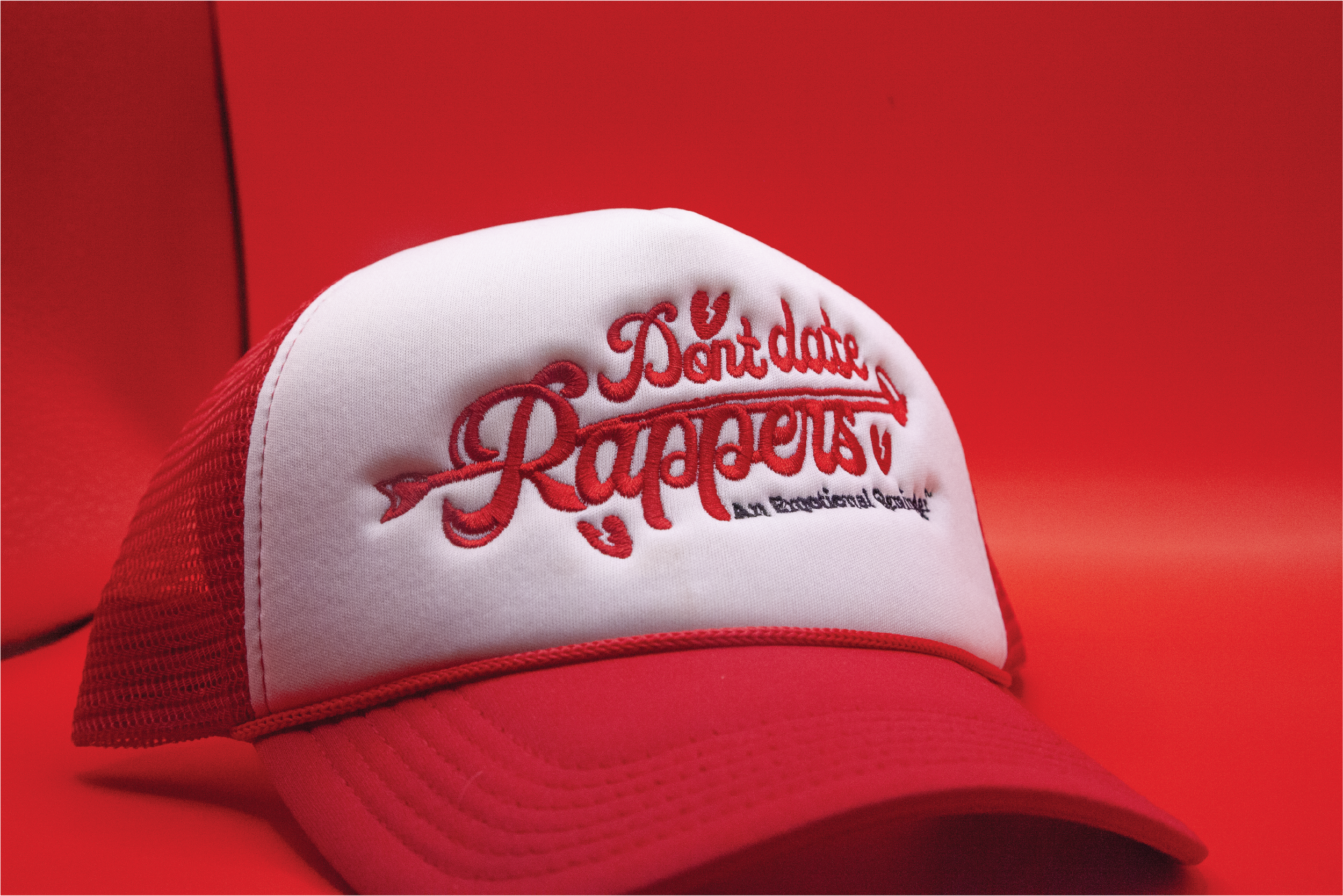 Cherry Bomb "Don't Date Rappers" Trucker Hat