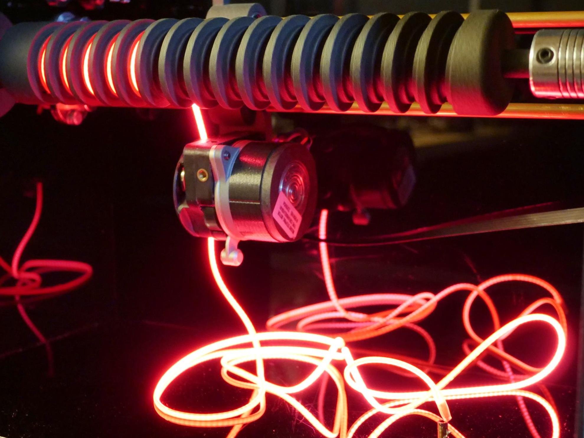   Spindle Stitch  is a designed object that belongs to a series of works exploring the interplay between material limits, visual aesthetics, and kinetic possibilities through the use of flexible LED filaments. Utilizing precision robotics, the work f
