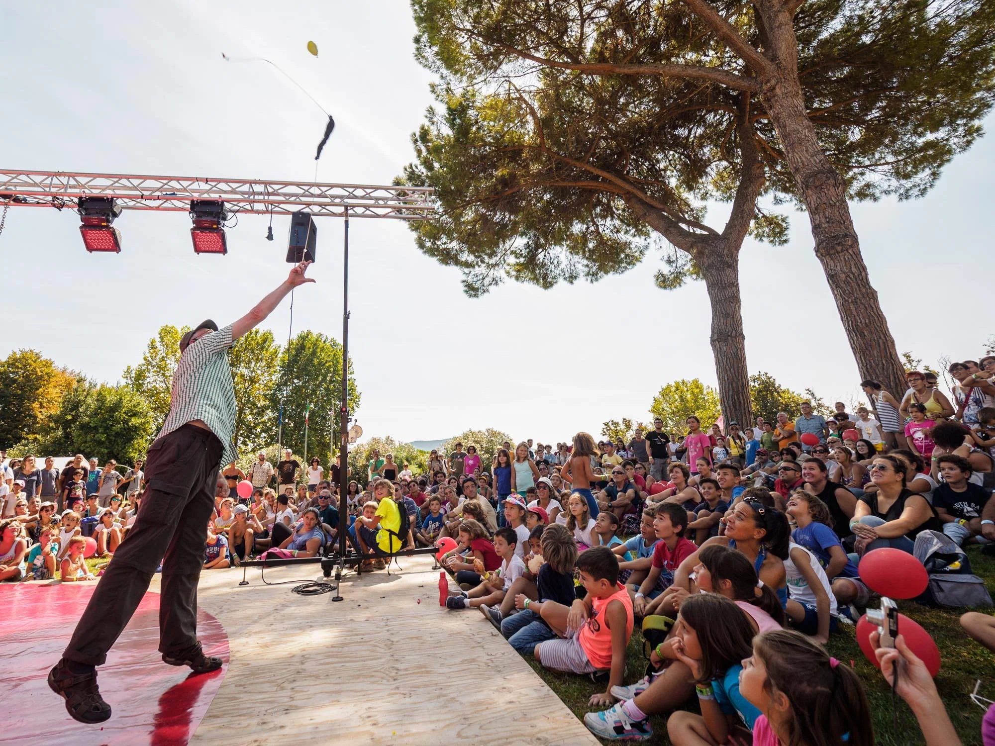 Slinging a water bomb over my audience