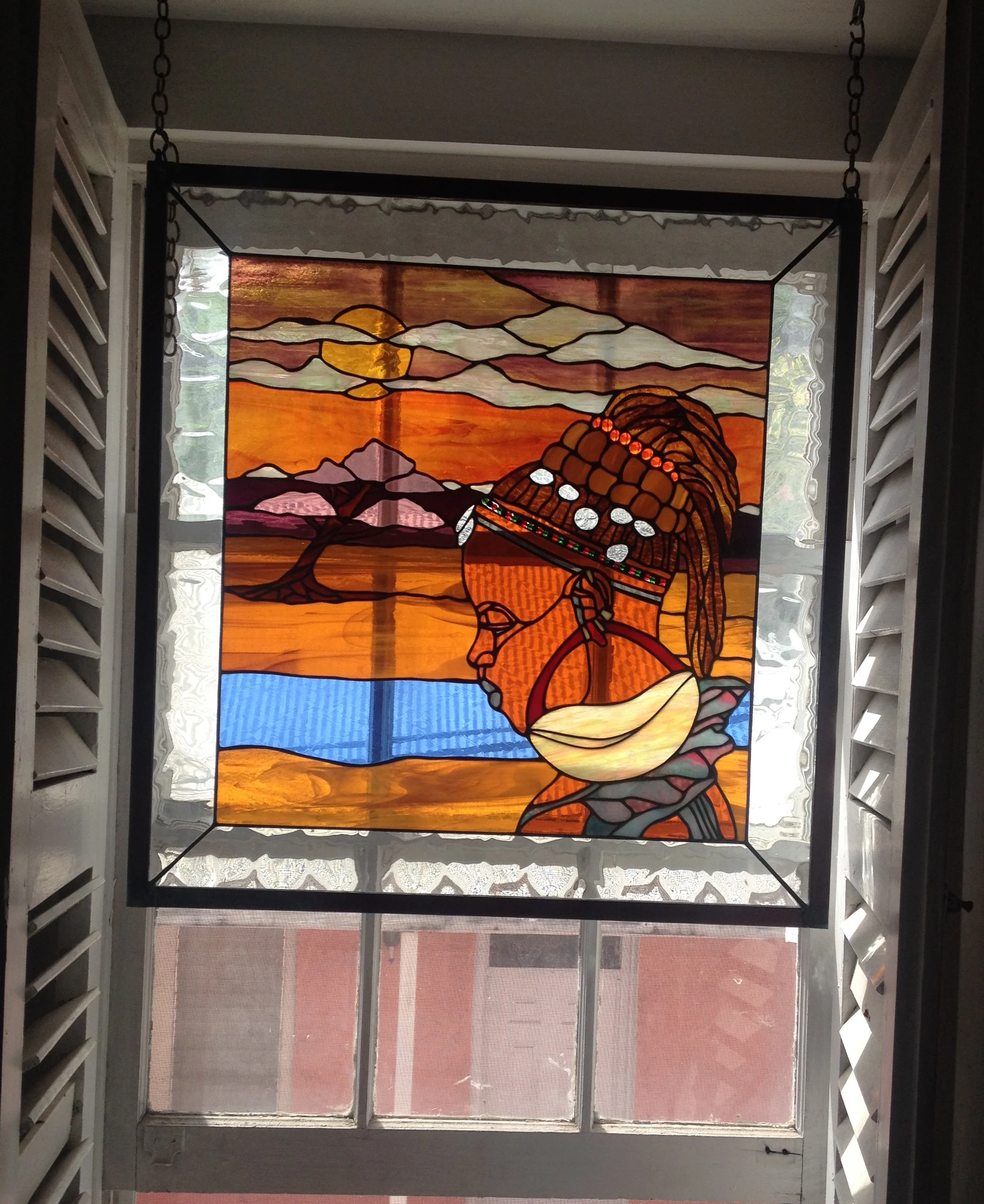 AfricanWomanWindowGlass.JPG