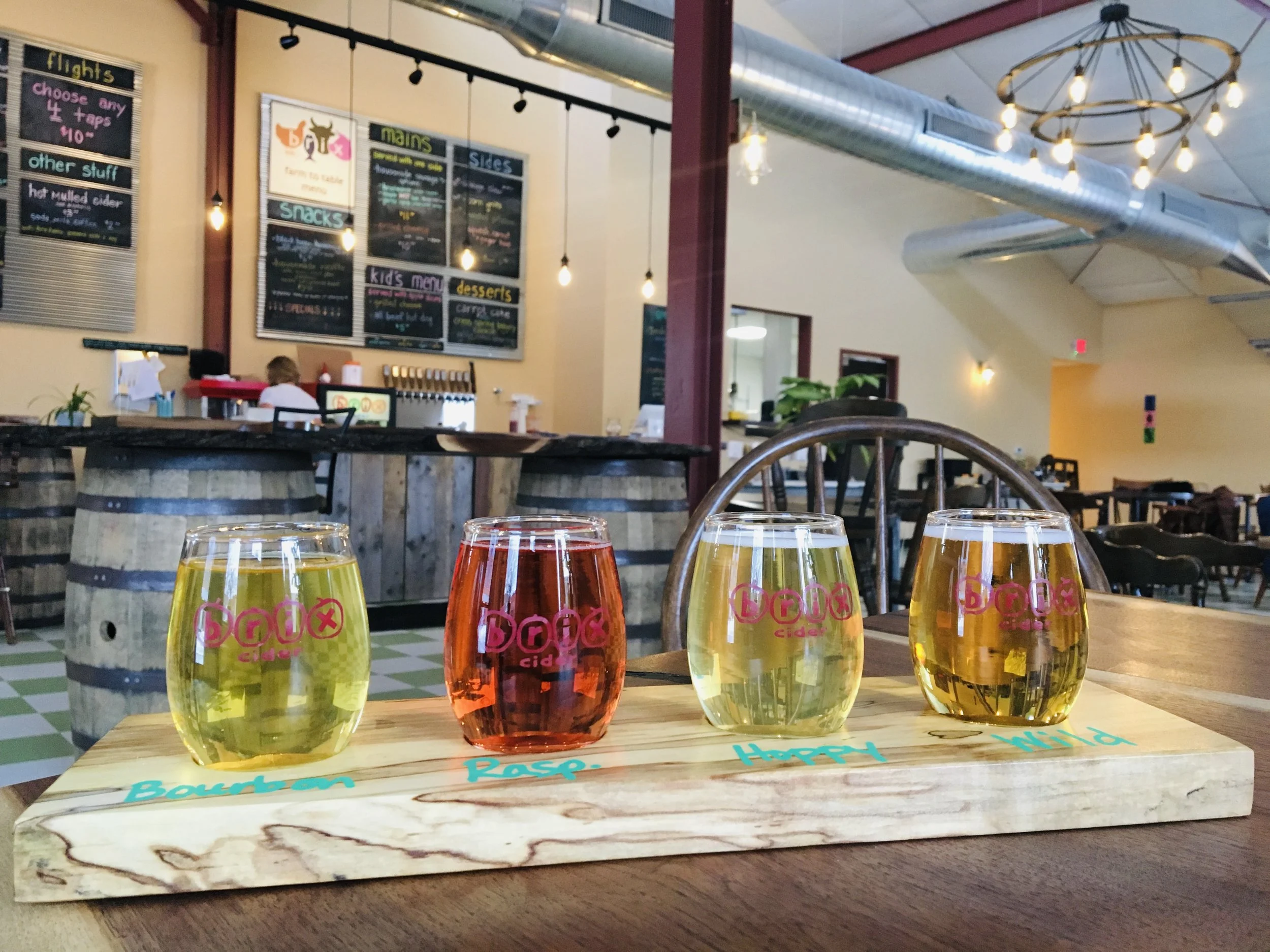 Above: Inside the Brix Cider tasting room with a flight of cider