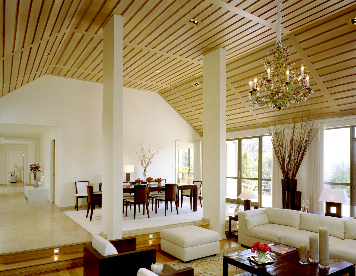 living:dining room with wood panel vaulted ceiling.jpg