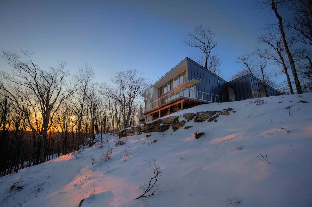 view from below modern home on a hill
