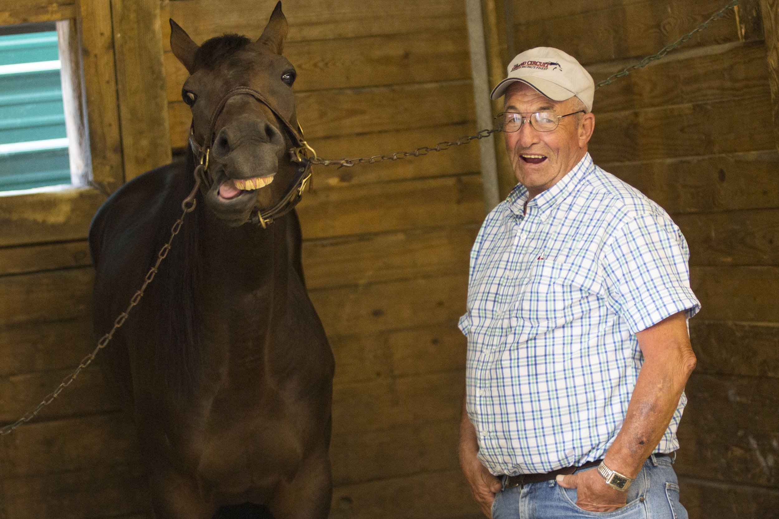  Larry Rhinhimier owner of the Standardbred horse to the left, 2015 Breeders Crown Champion Freaky Feet Pete, smiles for a portrait Saturday,&nbsp;Sept. 24 at Hoosier Park Racing and Casino in Anderson, IN.&nbsp; 