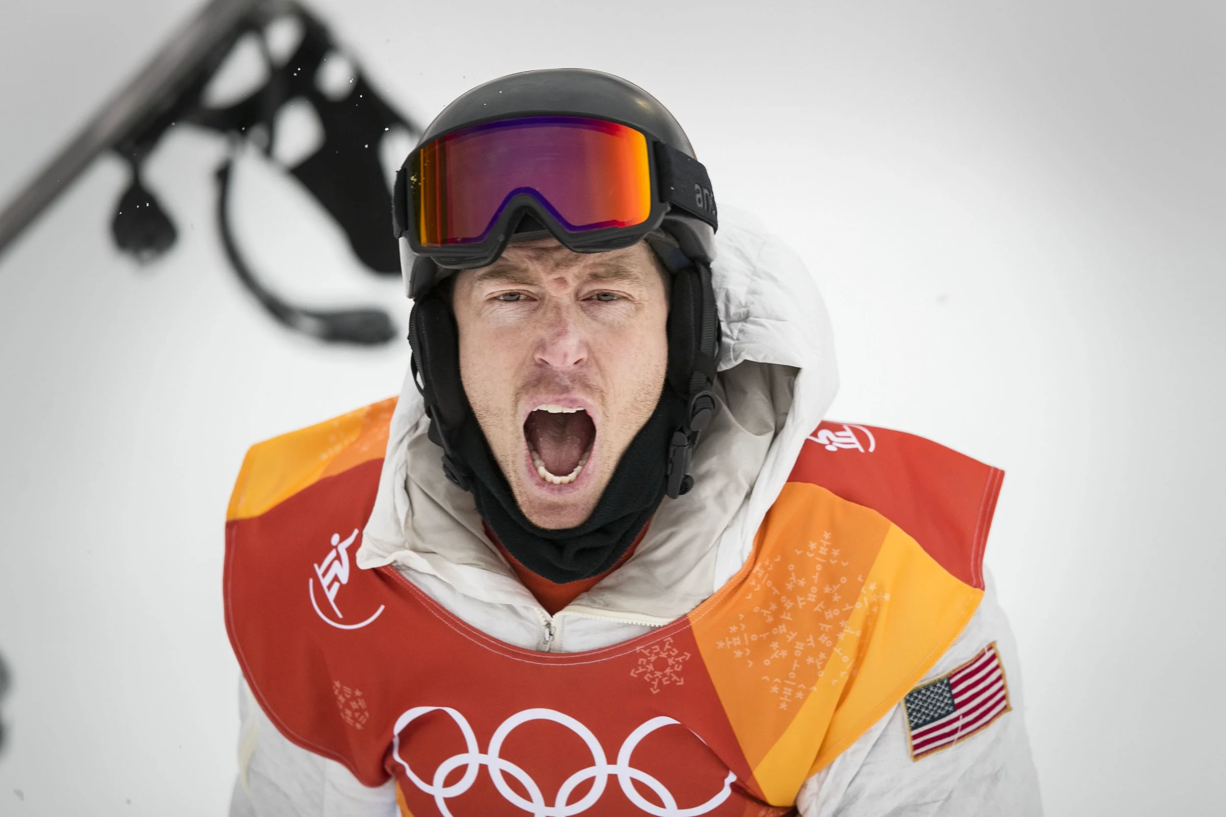  Halfpipe champion snowboarder Shaun White, throws his board and screams in excitement after seeing his score of 97.75 leading him to his third Olympic gold medal, Feb. 14 at Phoenix Snow Park. White broke into tears and hugged his friends and family