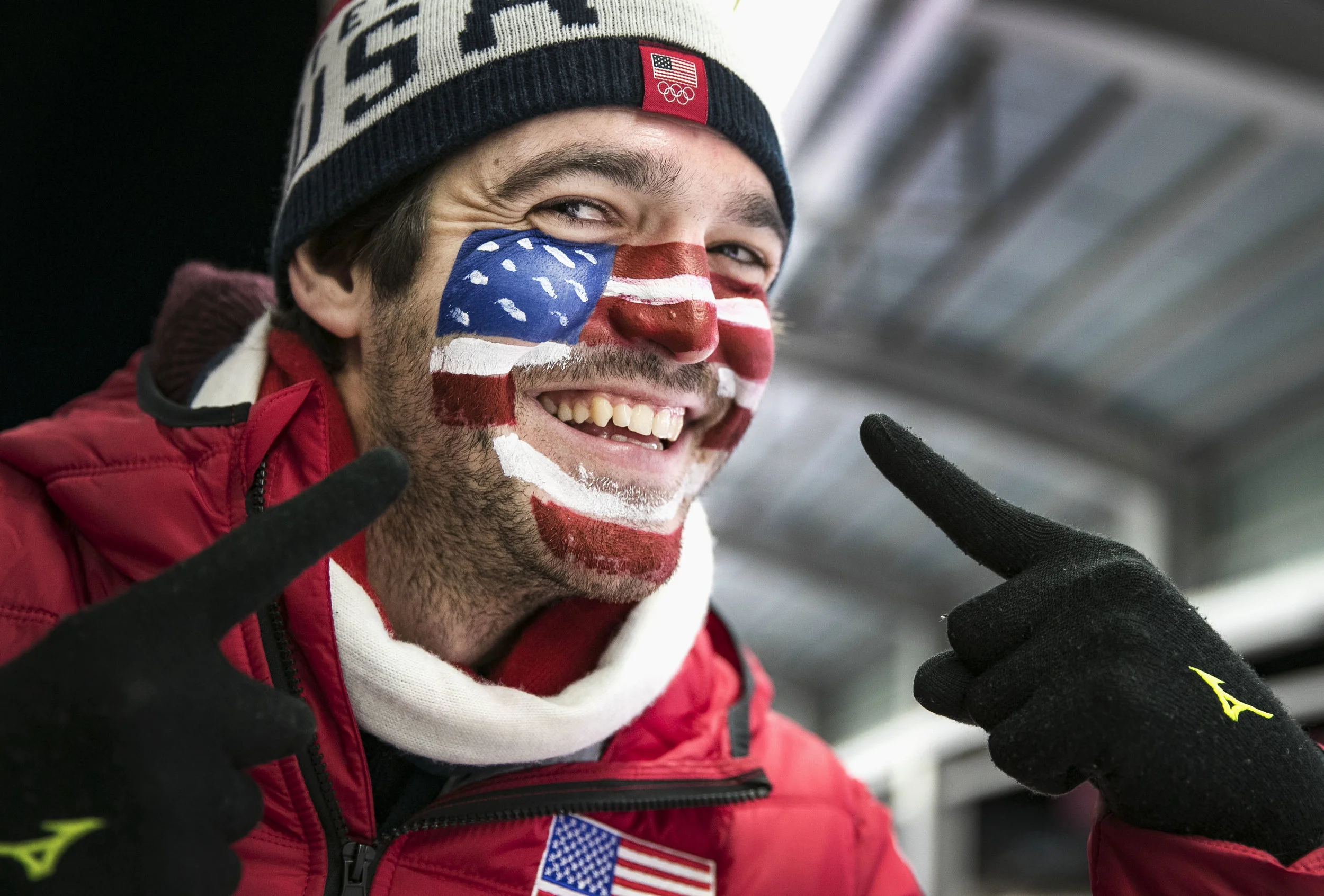  USA luger fan Alex Britcher from Baltimore, Maryland, cheers on his sister, Summer Britcher, as she competes in the luge team relay finals, Feb. 15, at Alpensia Sliding Centre, PyeongChang, South Korea. Alex, pauses to show off his patriotic face pa