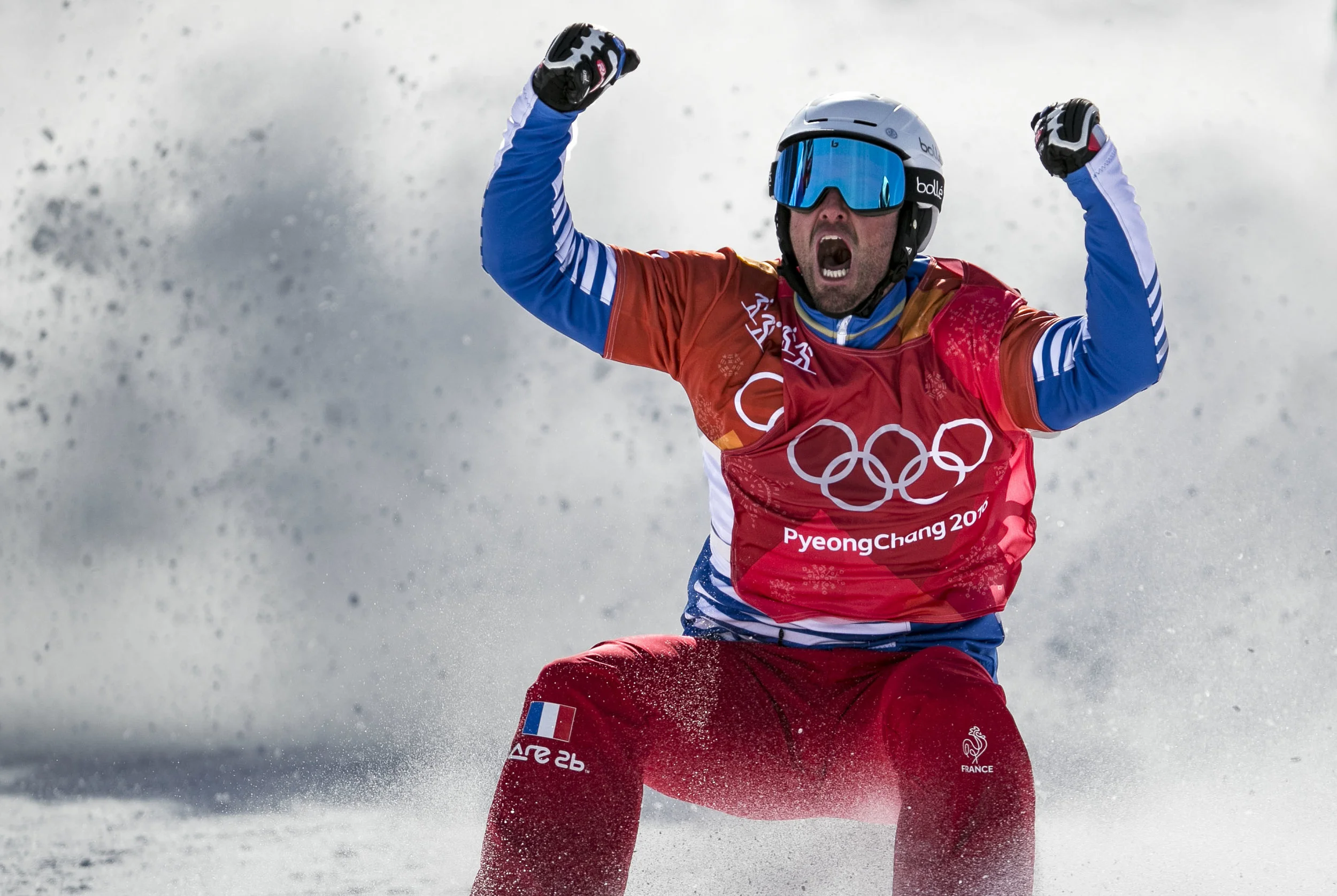  Back-to-back Olympic champion, France’s Pierre Vaultier, roars in excitement after securing his gold title in Men’s Snowboard Cross, Feb. 15, Phoenix Snow Park. The motocross like mash up of six snowboarders and a mix of obstacle courses, the Olympi