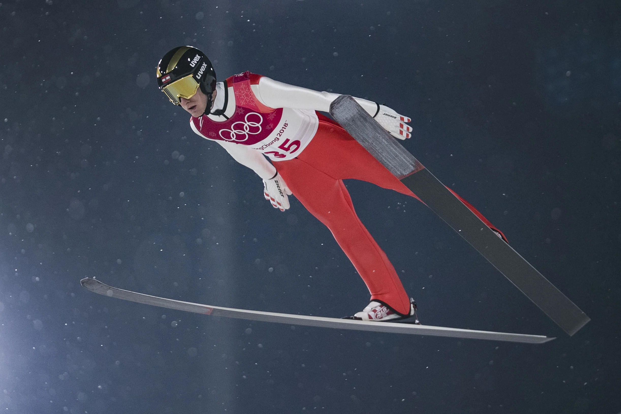  A ski jumper soars through the air searching to land on the hill at PyeongChang Ski Jumping Center, South Korea, Feb. 16 during the 2018 Winter Games. 