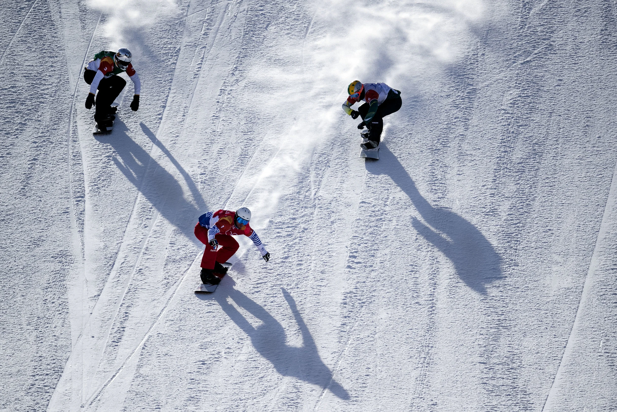  Athlete’s gathered to compete in motocross like mash up of six snowboarders and a mix of obstacle courses, the Olympic event Snowboard Cross, Feb. 15, at Phoenix Snow Park.  