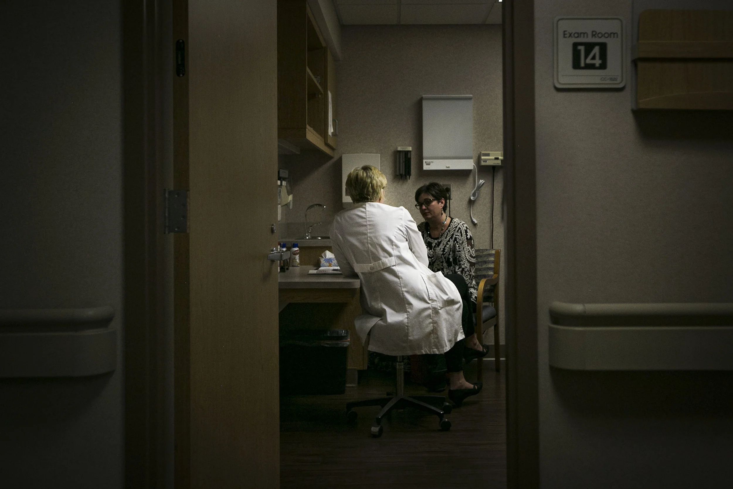  Bedside nurse Allison Spradlin listens carefully to a patient while she talks about her fears of her cancer treatment, Feb. 27, IU Ball Memorial Hospital, Muncie, IN. Allison builds a relationship with her patients by having difficult conversations 