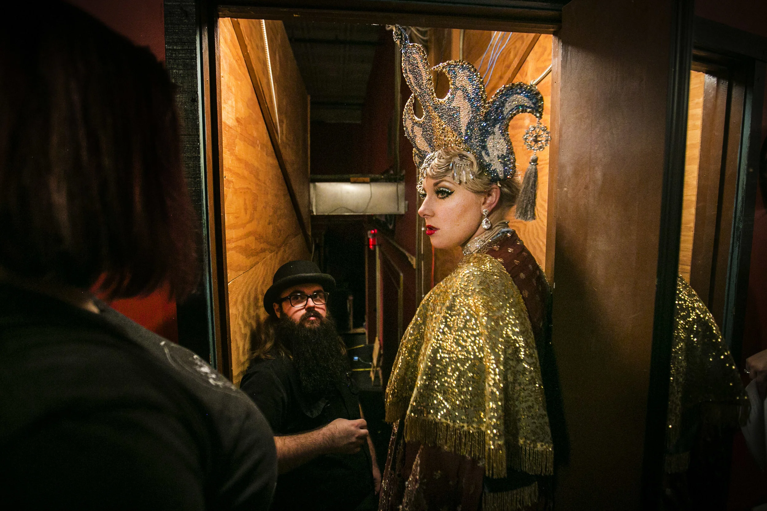  Stephanie Hutchison looks over her shoulder listening to another dancer before the start of a burlesque show at Mark’s III, Feb. 27, Muncie, IN. Hutchison has always been a dancer, but burlesque has not always been apart of her life. Over four years