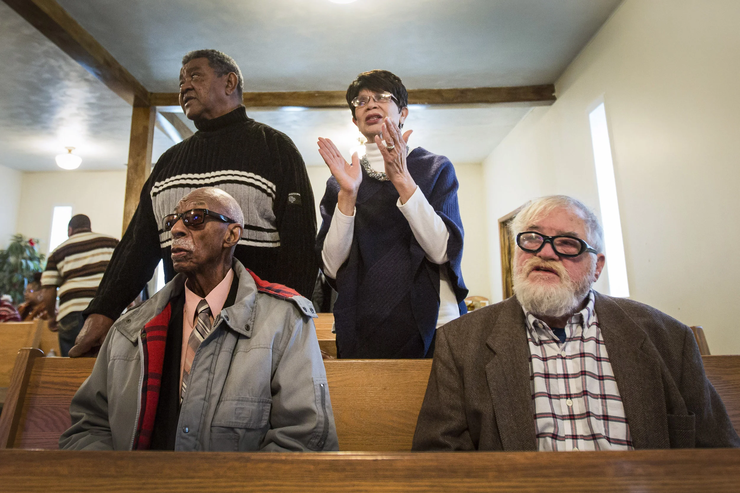  Mary stands up and claps her hands and sings to the hymns, Feb. 10, at Kirby Avenue Church of God, in Muncie, IN. Mary Dollison noticed the decline in grades while students were away for summer break and decided to start Motivate Our Minds (MOM), in