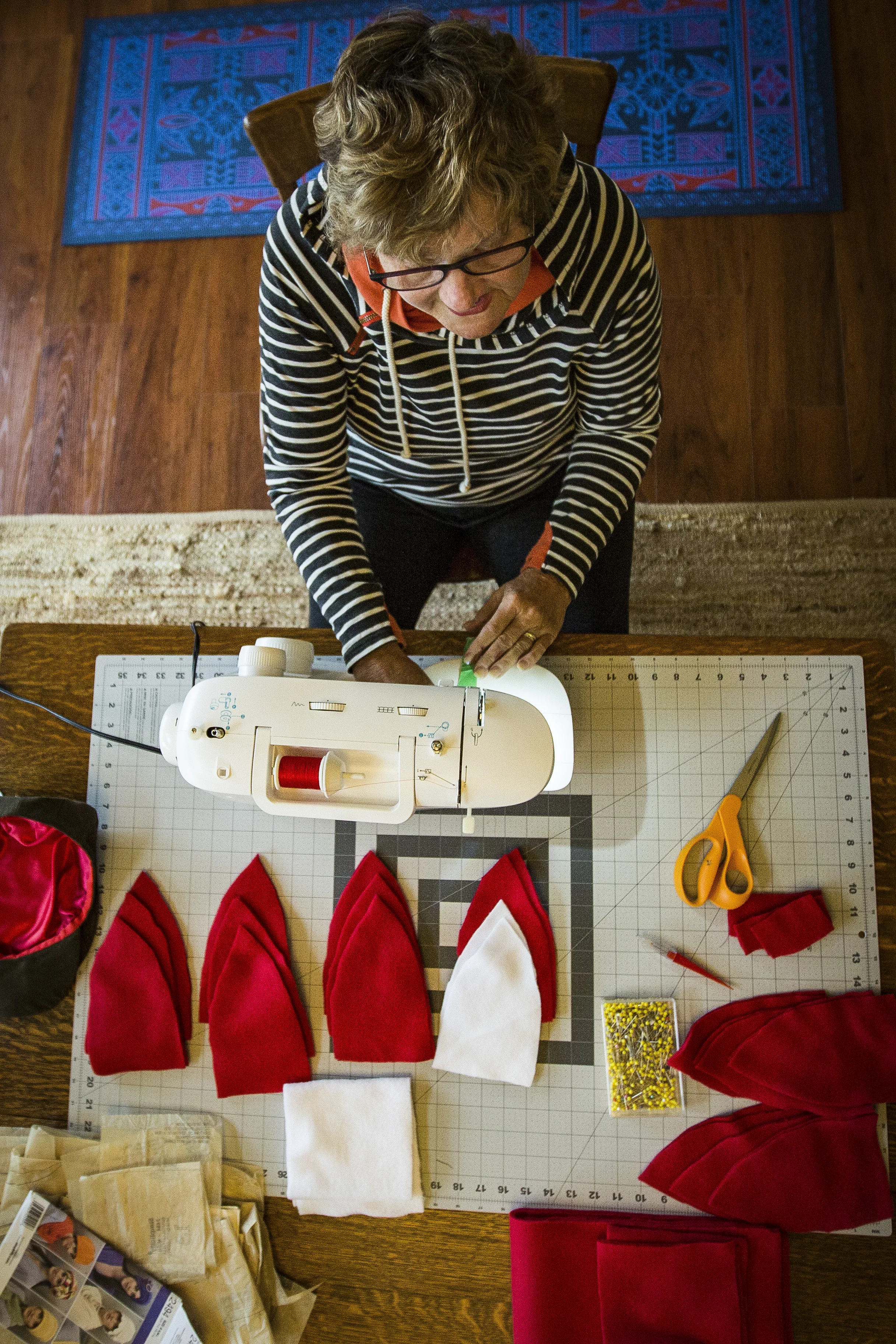  Sitting at her dining room table, Nancy sews a hat in her Muncie home. “If you can create, do,” said Nancy one afternoon and she wasn’t kidding either. Nancy has created something every moment she can by sewing hats, clothing, quilts, and costumes. 