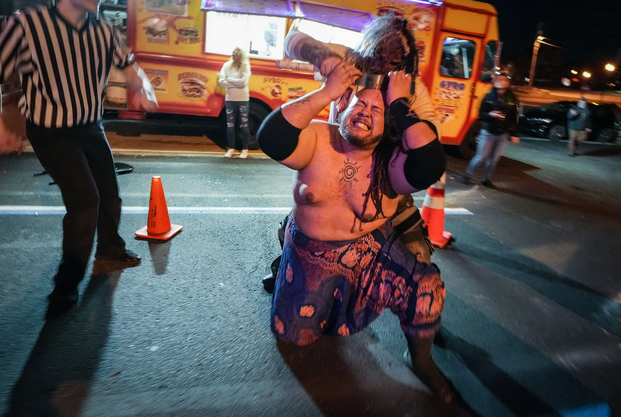  Satu Jinn braces himself as The Carver of Cutters Ally cuts his head with a knife during a death match on Sunday, March 20, 2022, at Indiana City Brewery in Indianapolis. 