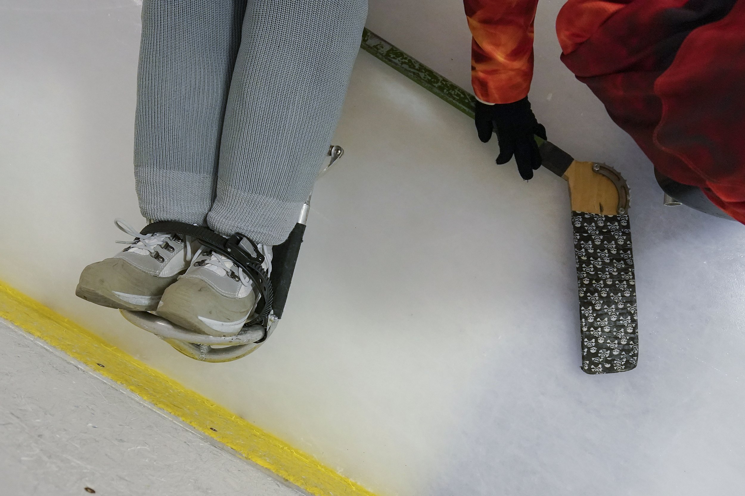  Marie Harman, 38, reaches for her hockey stick during a scrimmage on January 22, 2022, at Perry Park in Indianapolis. Harman has been playing for Indy Steel since 2020 after the pandemic shut down power soccer. Since then, Harman has immersed hersel