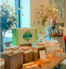 Sam was inspired by his passion in soap-making and scent memory to leave the corporate world behind to open his own business. He wanted to find a way to make environmentally friendly products that smell fantastic, so he started experimenting in soap-making. His dedication to his family, the community and the environment led him to opening Distinct Bath & Body and now he wants to share his passion with Six Corners!