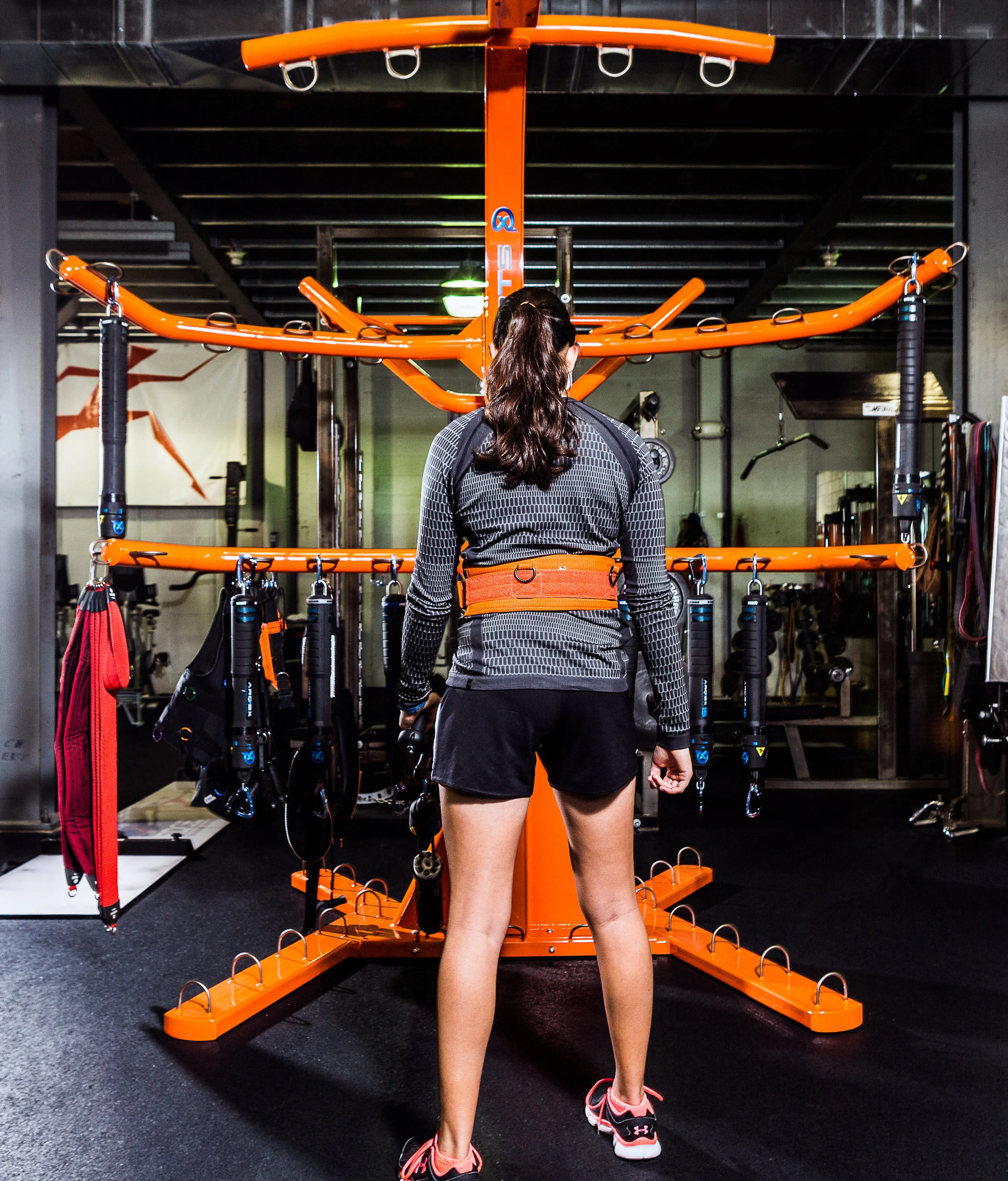 Athlete standing in front of the ARQEX