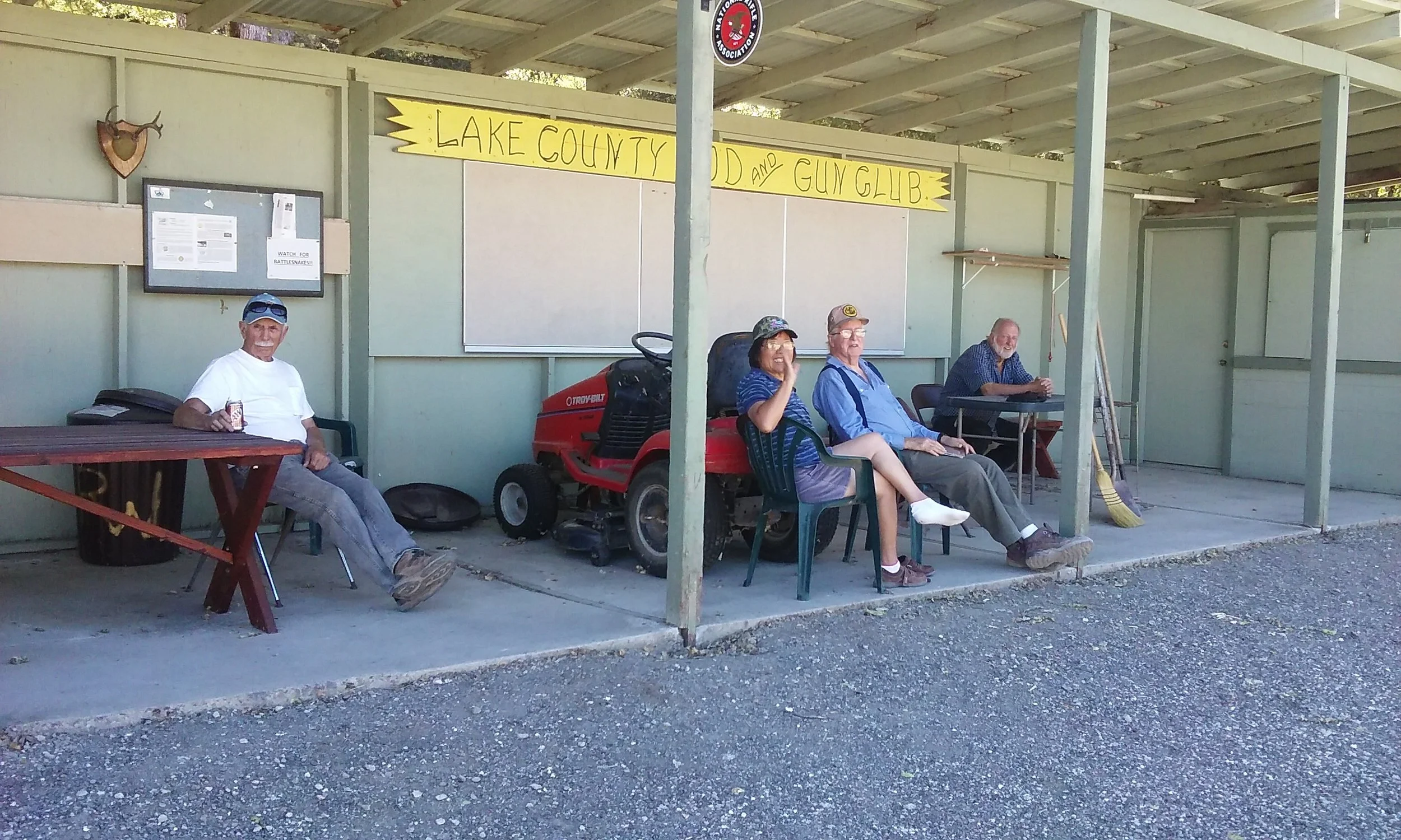 Very tired work party after spreading crushed concrete around all morning