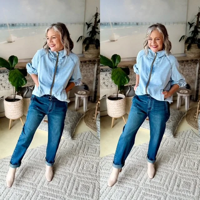 women standing light denim jacket dark denim jeans boots