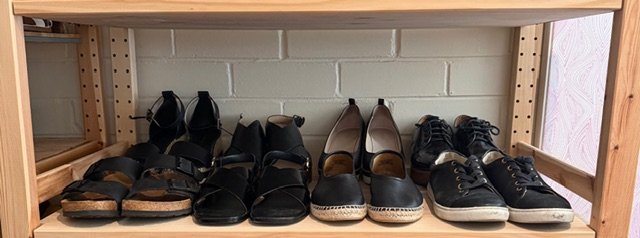 black street sneakers in rack