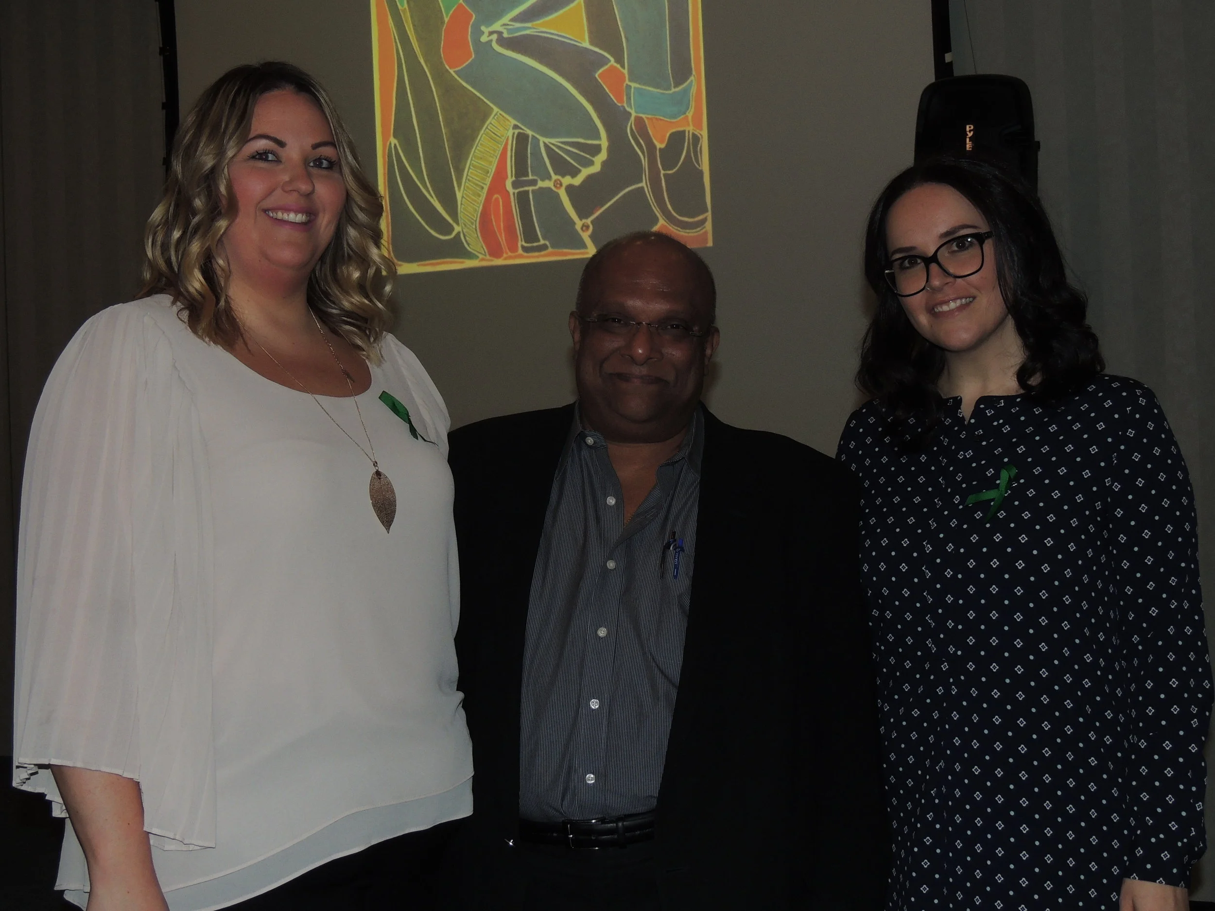 Neuropsychiatrist Dr. Seyone (centre) with Mind Forward Brain Injury Services team members Ashley Budd & Lisa Philips-Borges. Photo by Mira Louis.