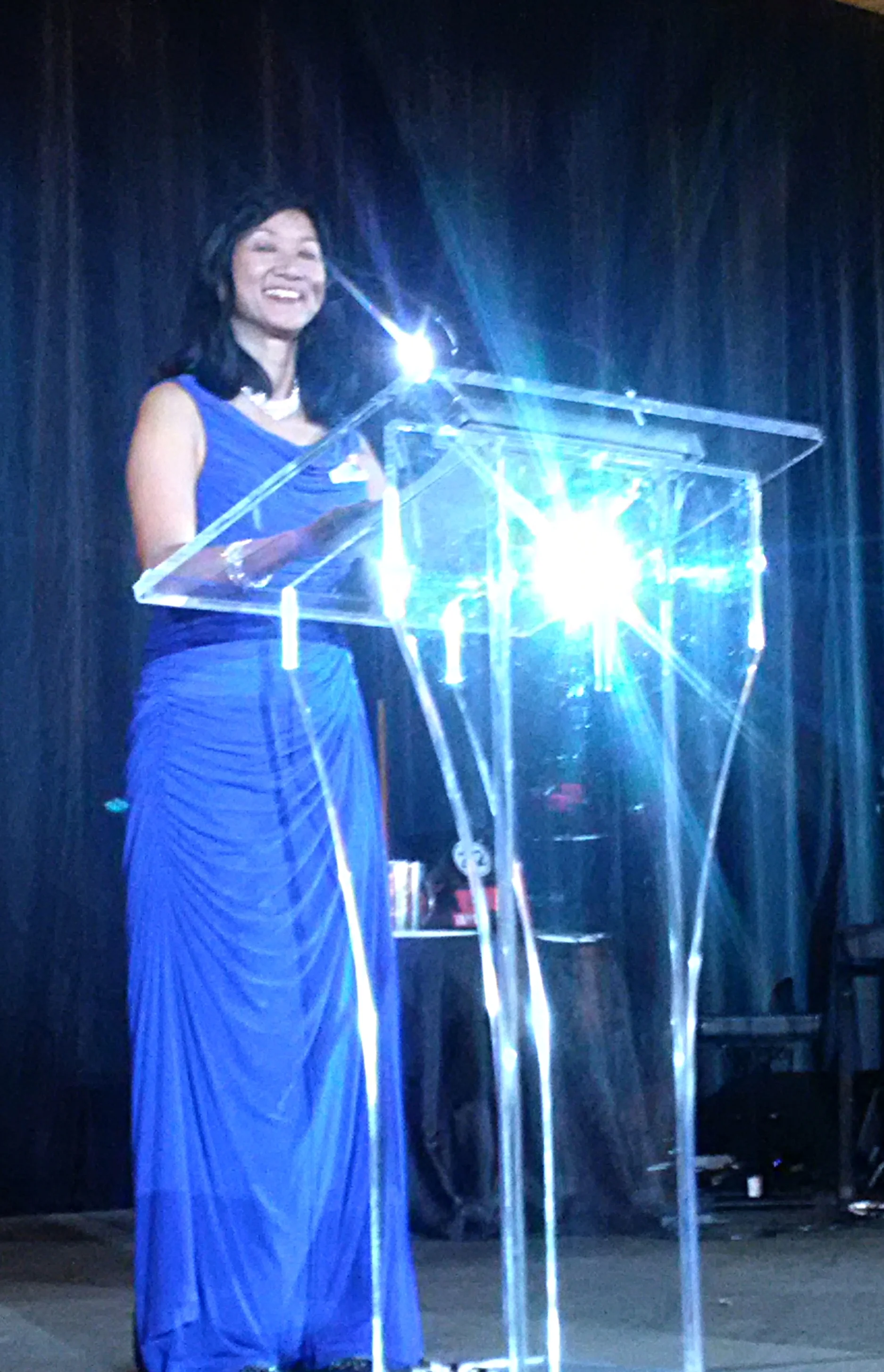 MAC President Jeannette Chau takes the podium at the MARTY ceremony and announces the beginning of the gala!