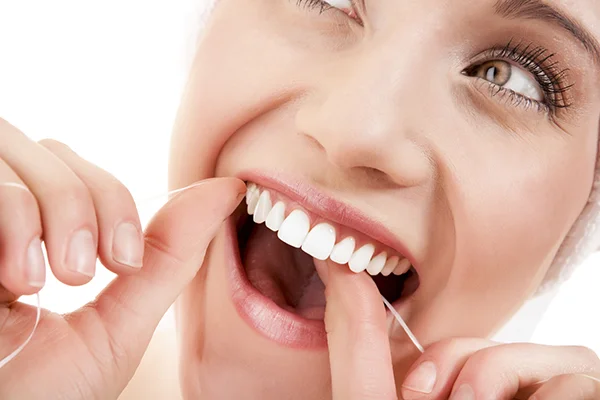 Woman-Flossing-600pix.jpg