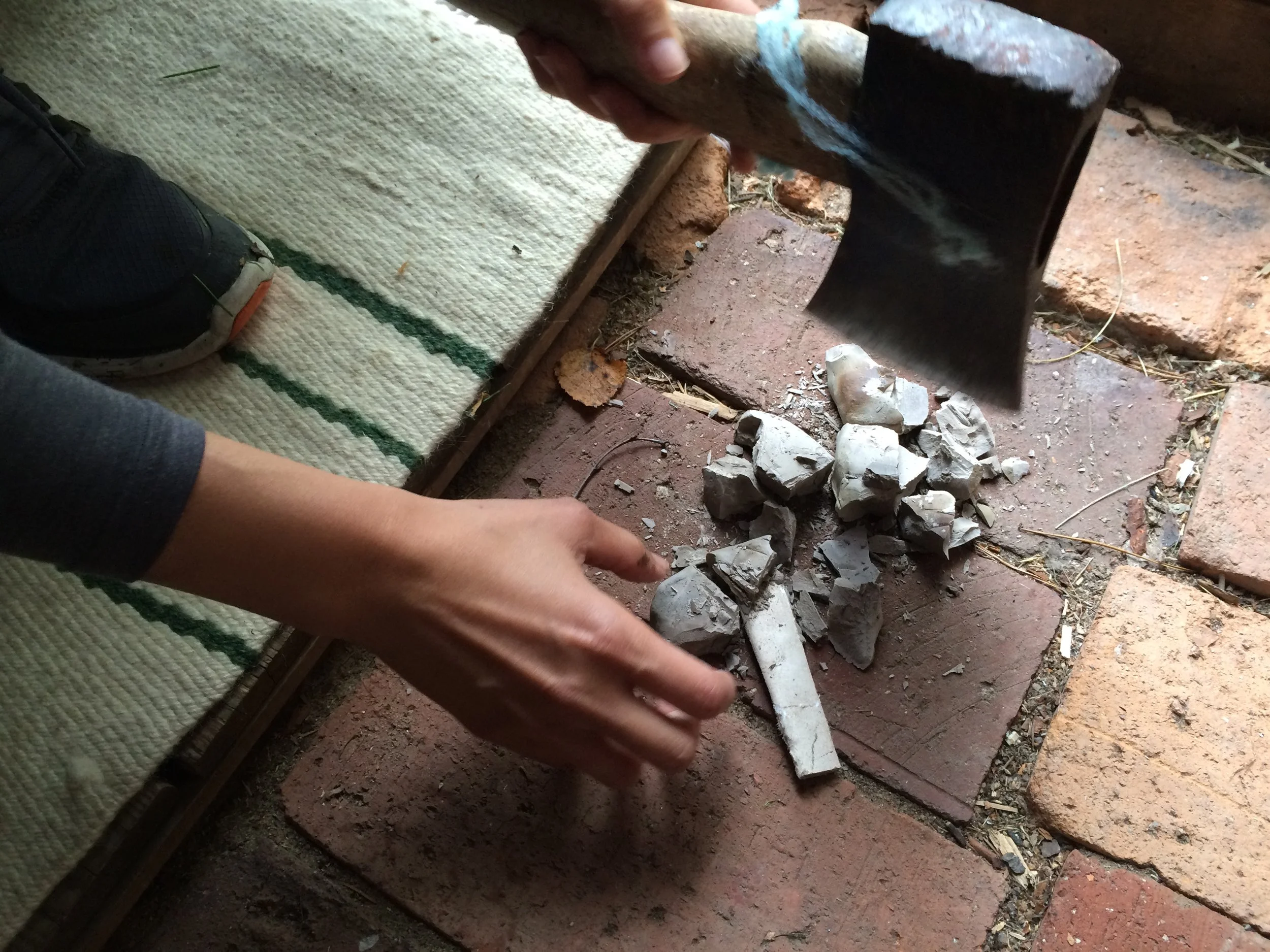  Breaking a tablet to extract the hidden scroll. 