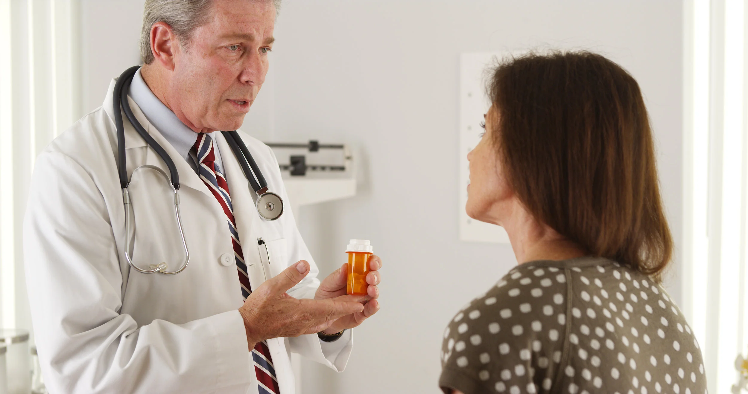Doctor and patient discussing medication