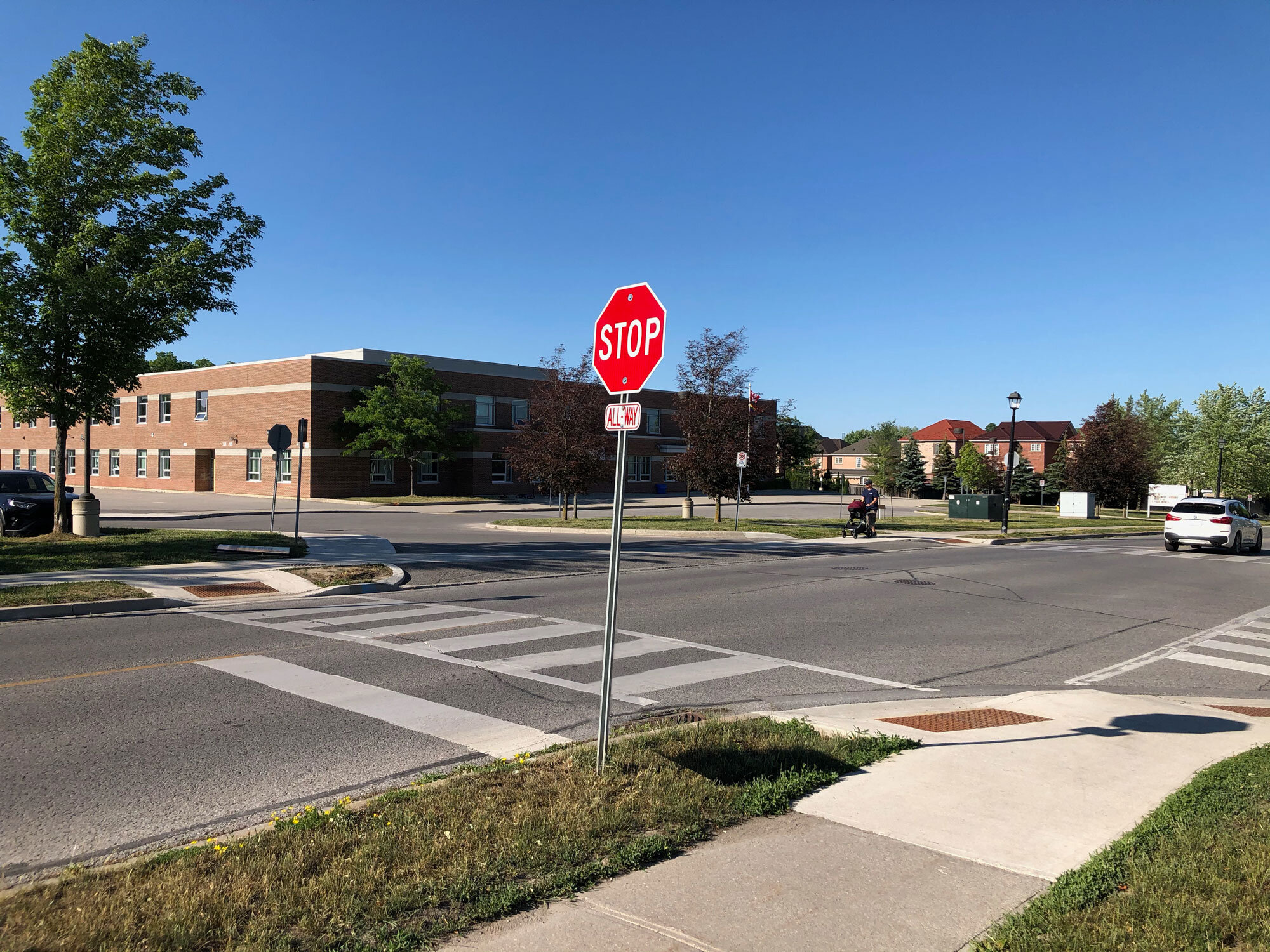 Summerhill South: New Fully Accessible School Crosswalk and New Stop Sign at Peter Hall Drive and Sawmill Valley Drive